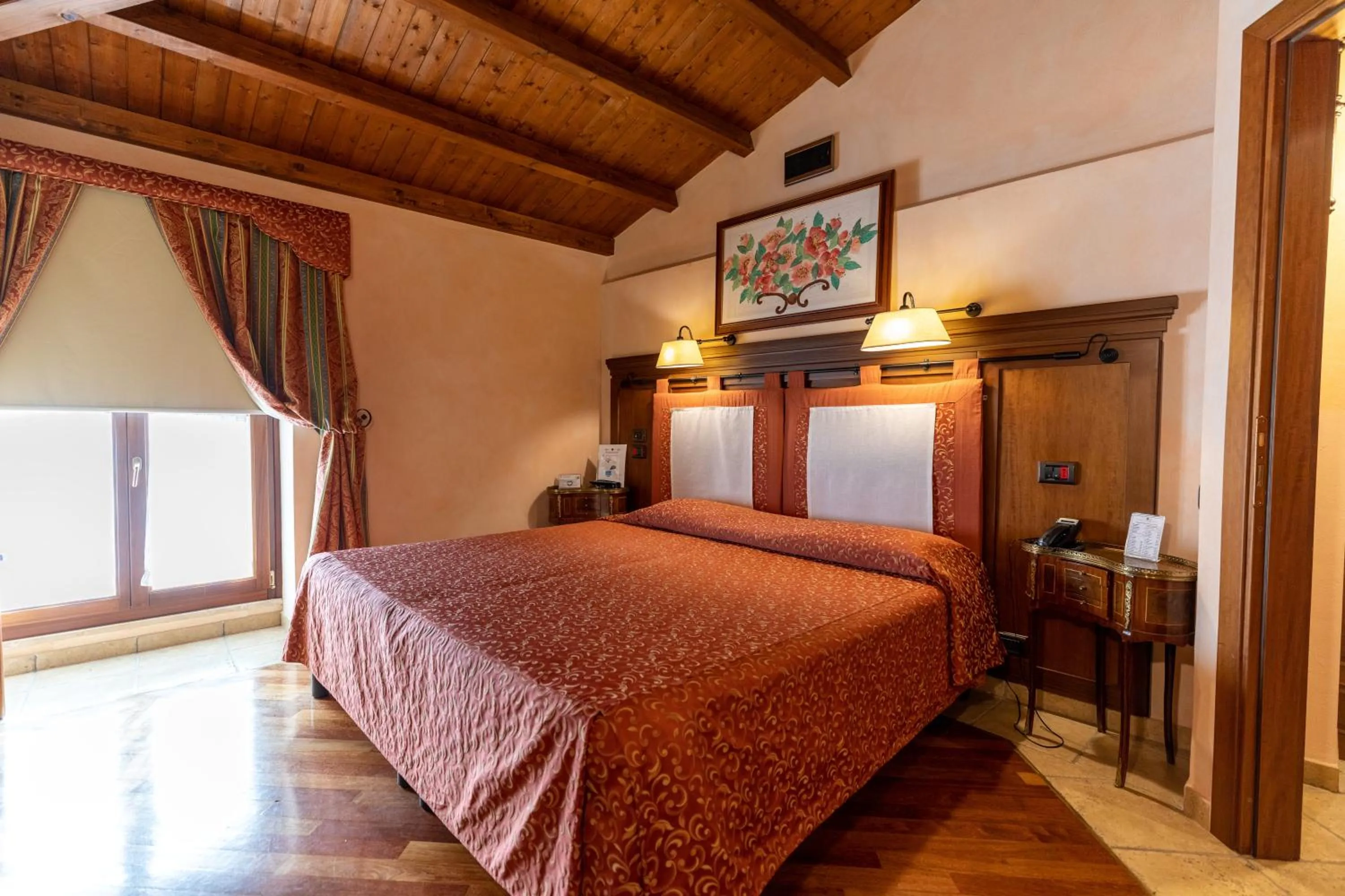 Bedroom, Bed in Relais Abbazia Santa Anastasia Resort & Winery
