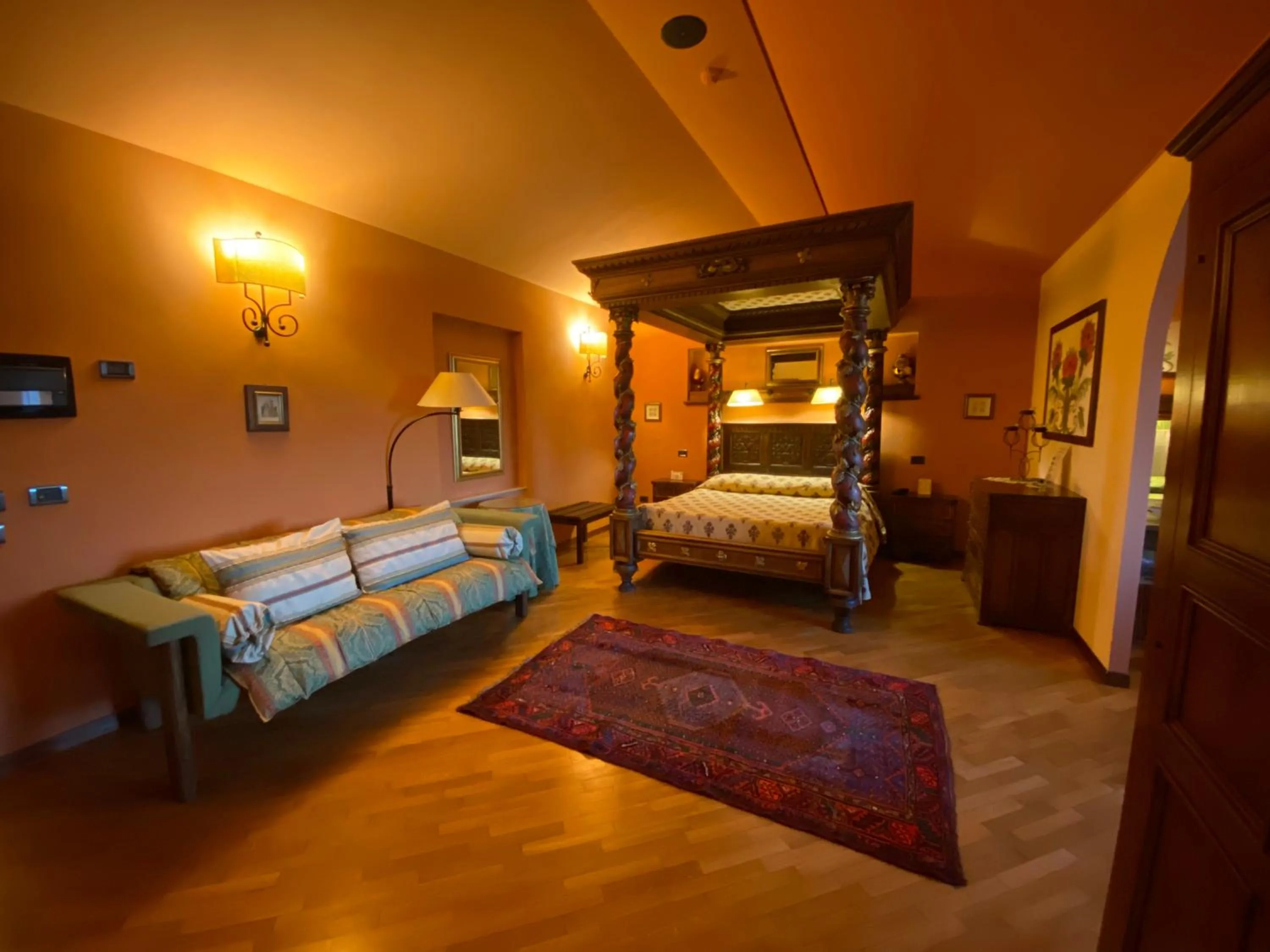 Bed in Relais Abbazia Santa Anastasia Resort & Winery