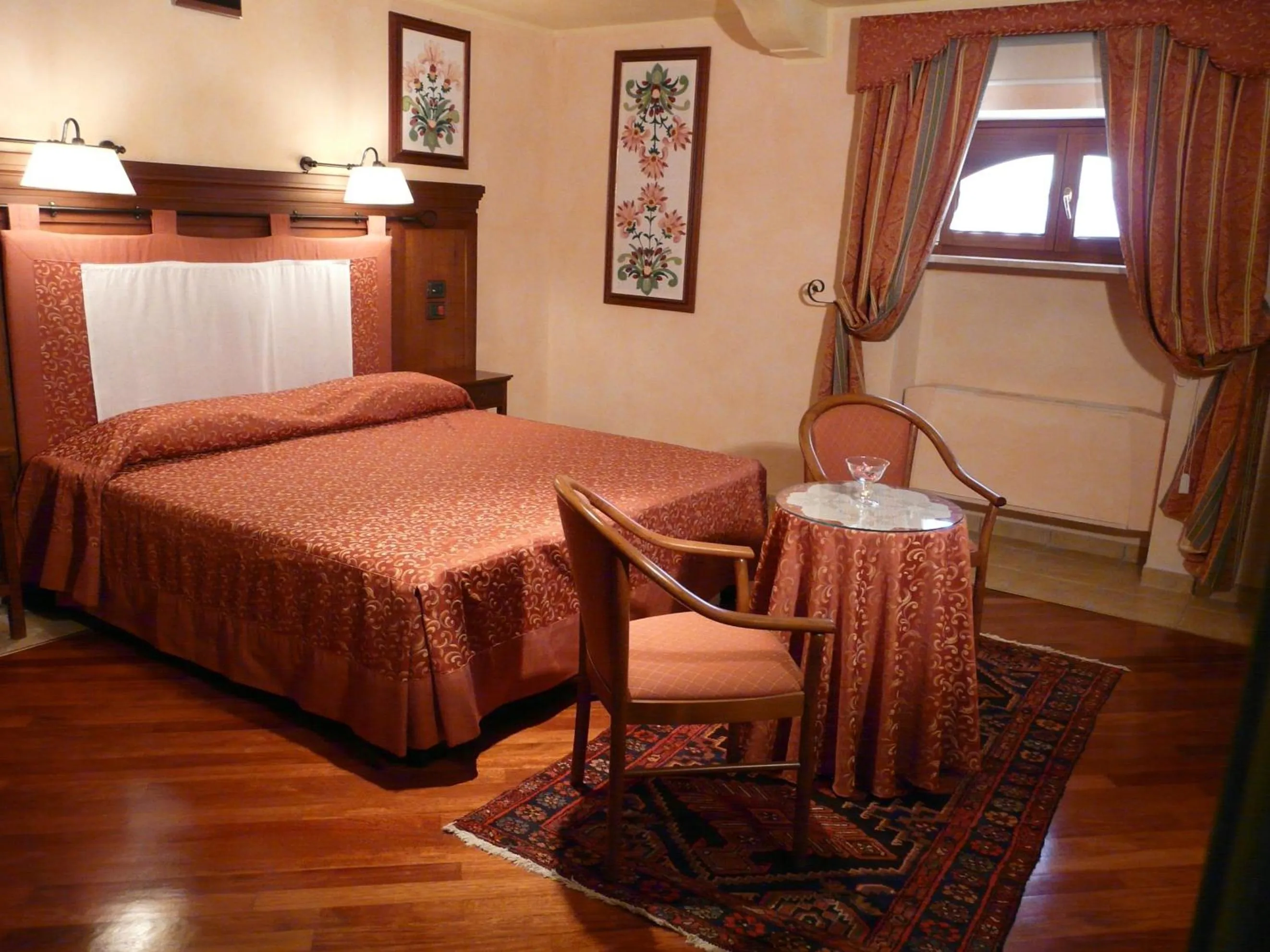 Bed in Relais Abbazia Santa Anastasia Resort & Winery