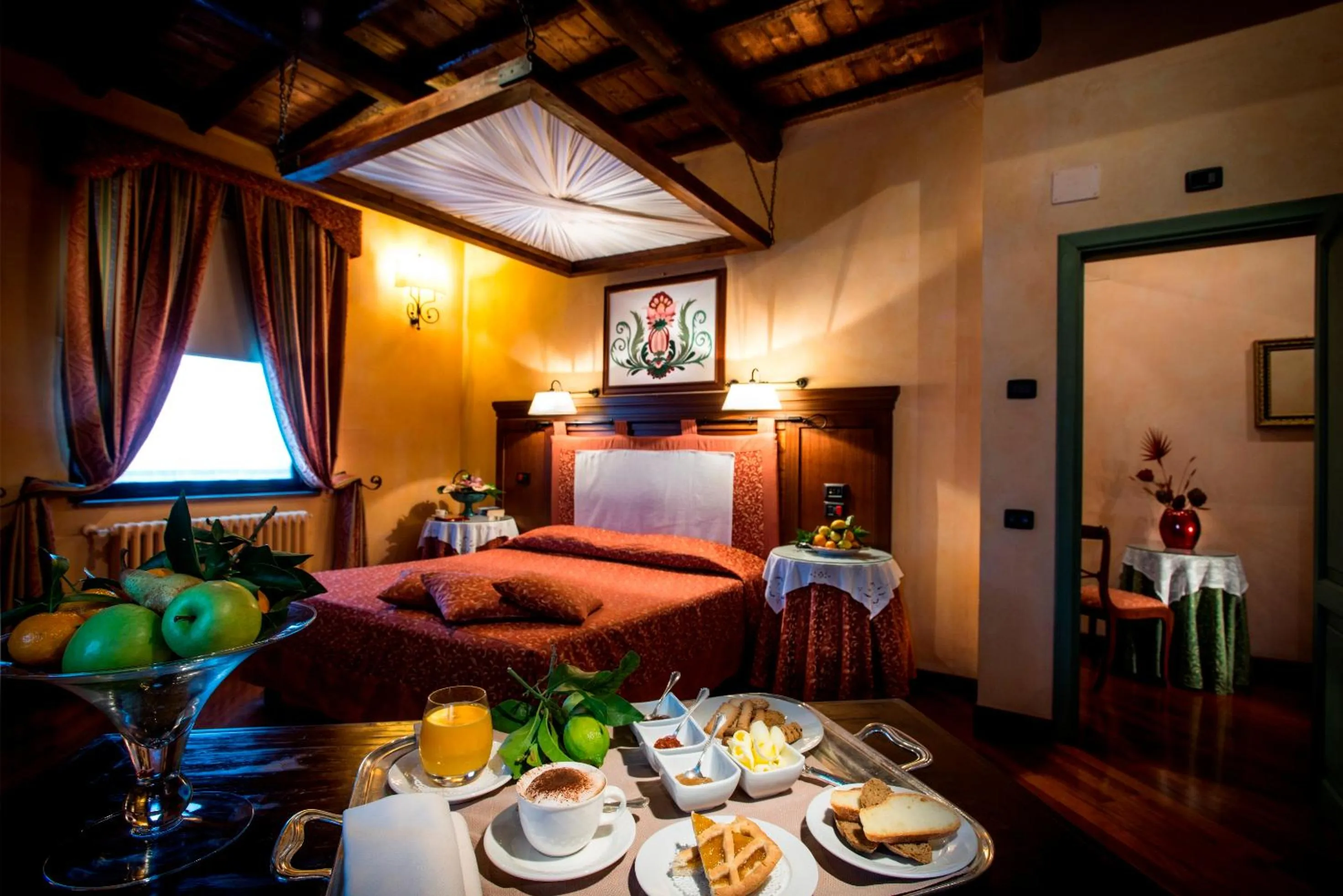 Photo of the whole room, Bed in Relais Abbazia Santa Anastasia Resort & Winery