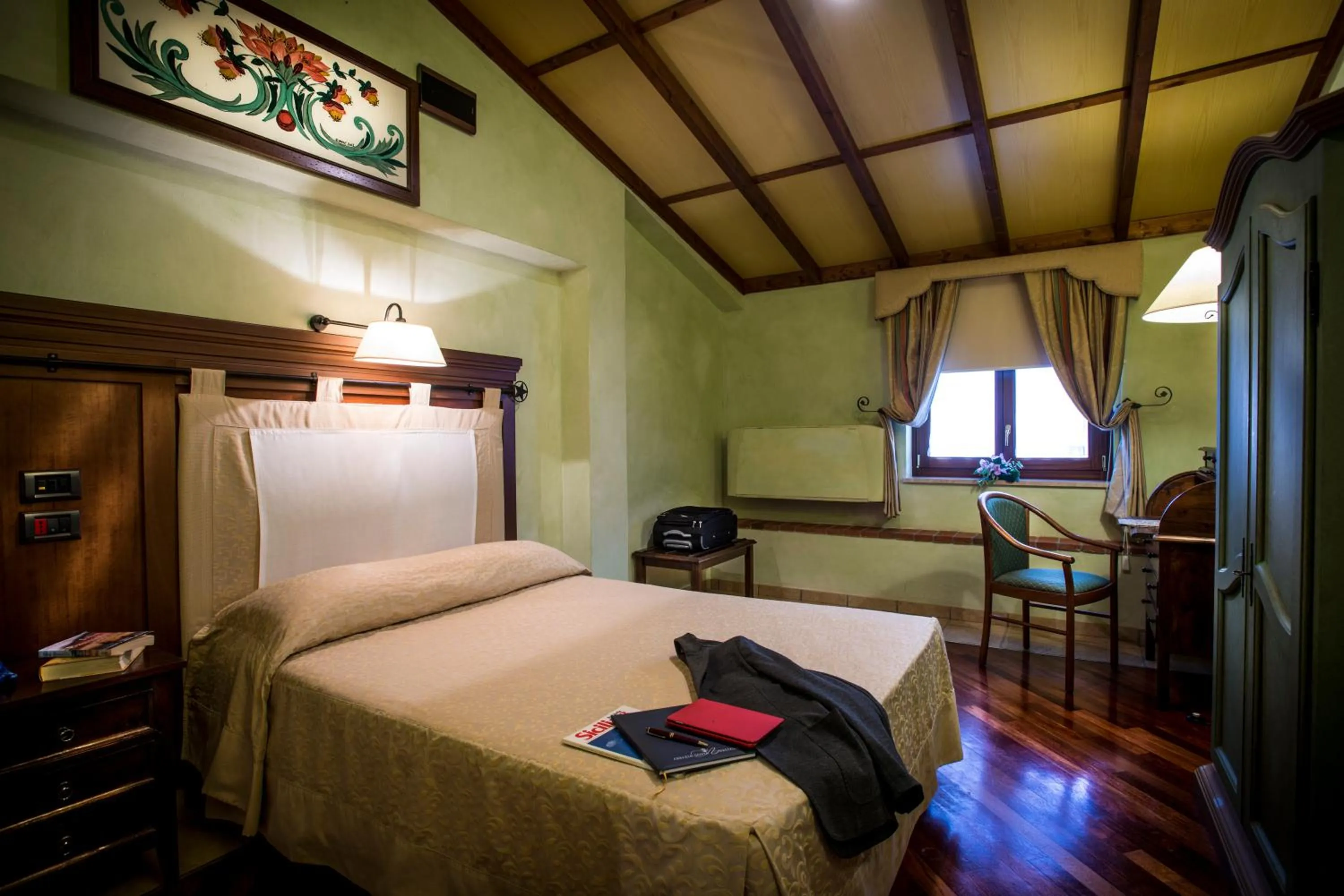 Photo of the whole room, Bed in Relais Abbazia Santa Anastasia Resort & Winery