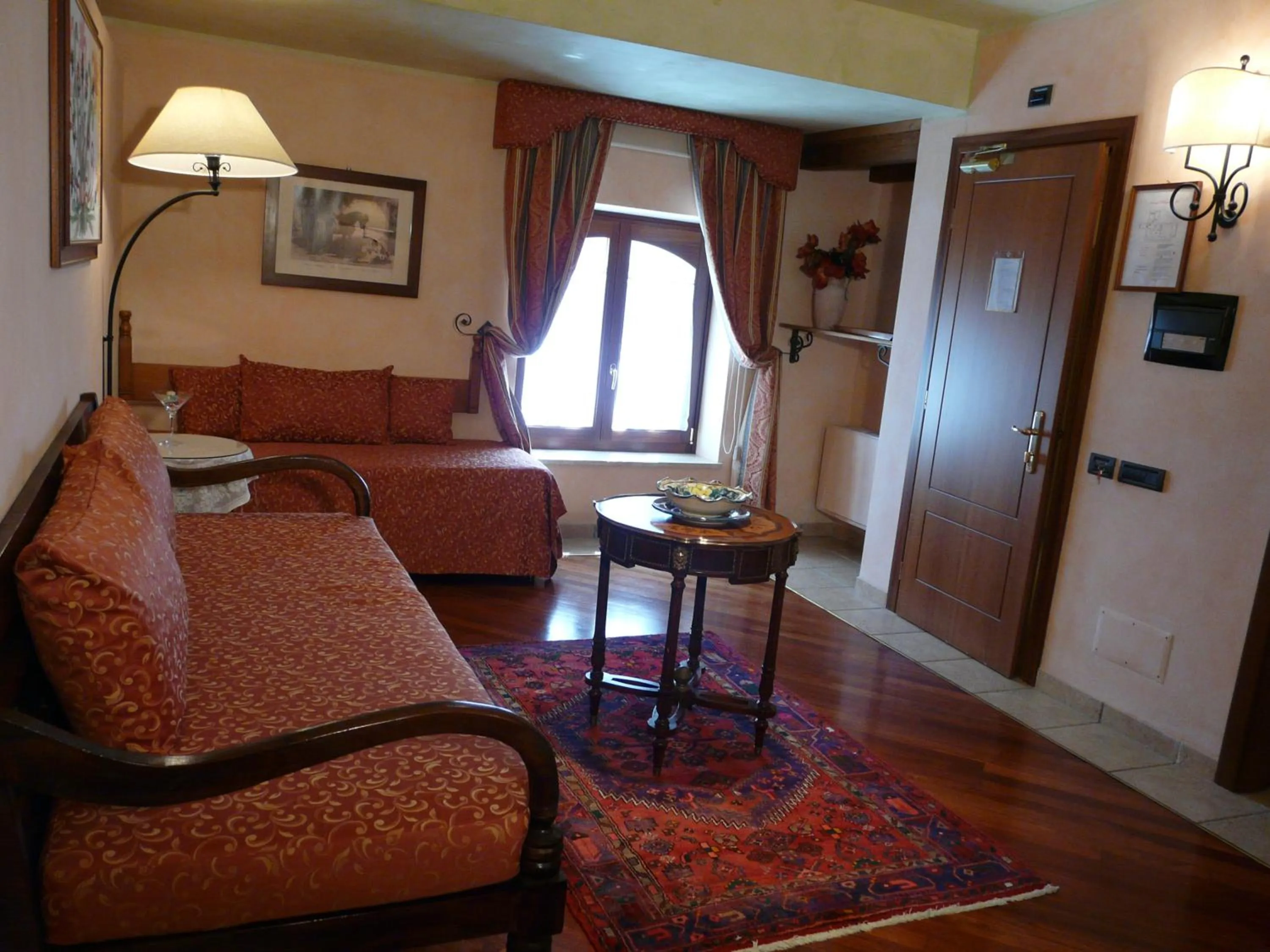 Bed in Relais Abbazia Santa Anastasia Resort & Winery