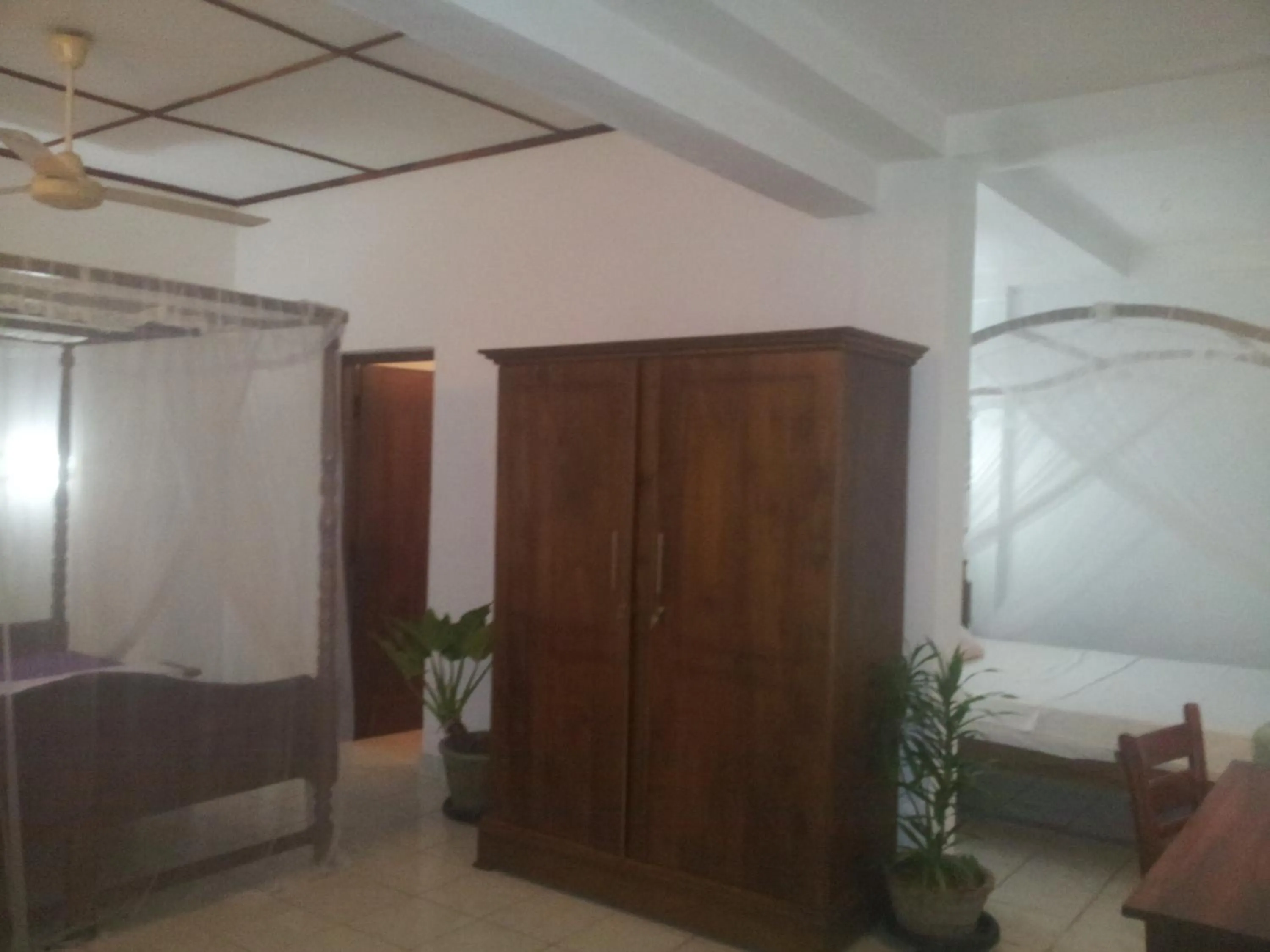 Bed in White Bridge House & Resort