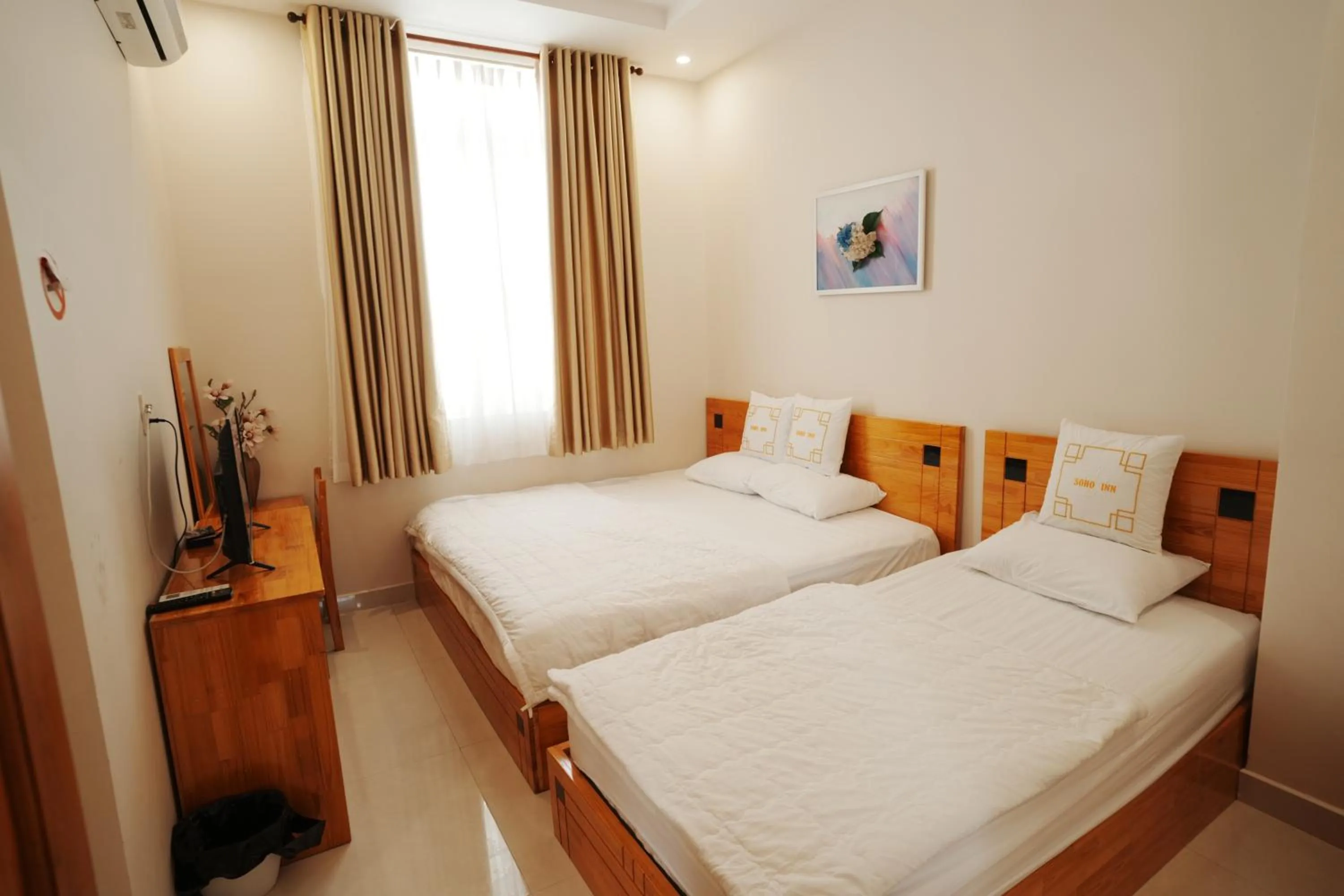 Photo of the whole room in Soho Inn