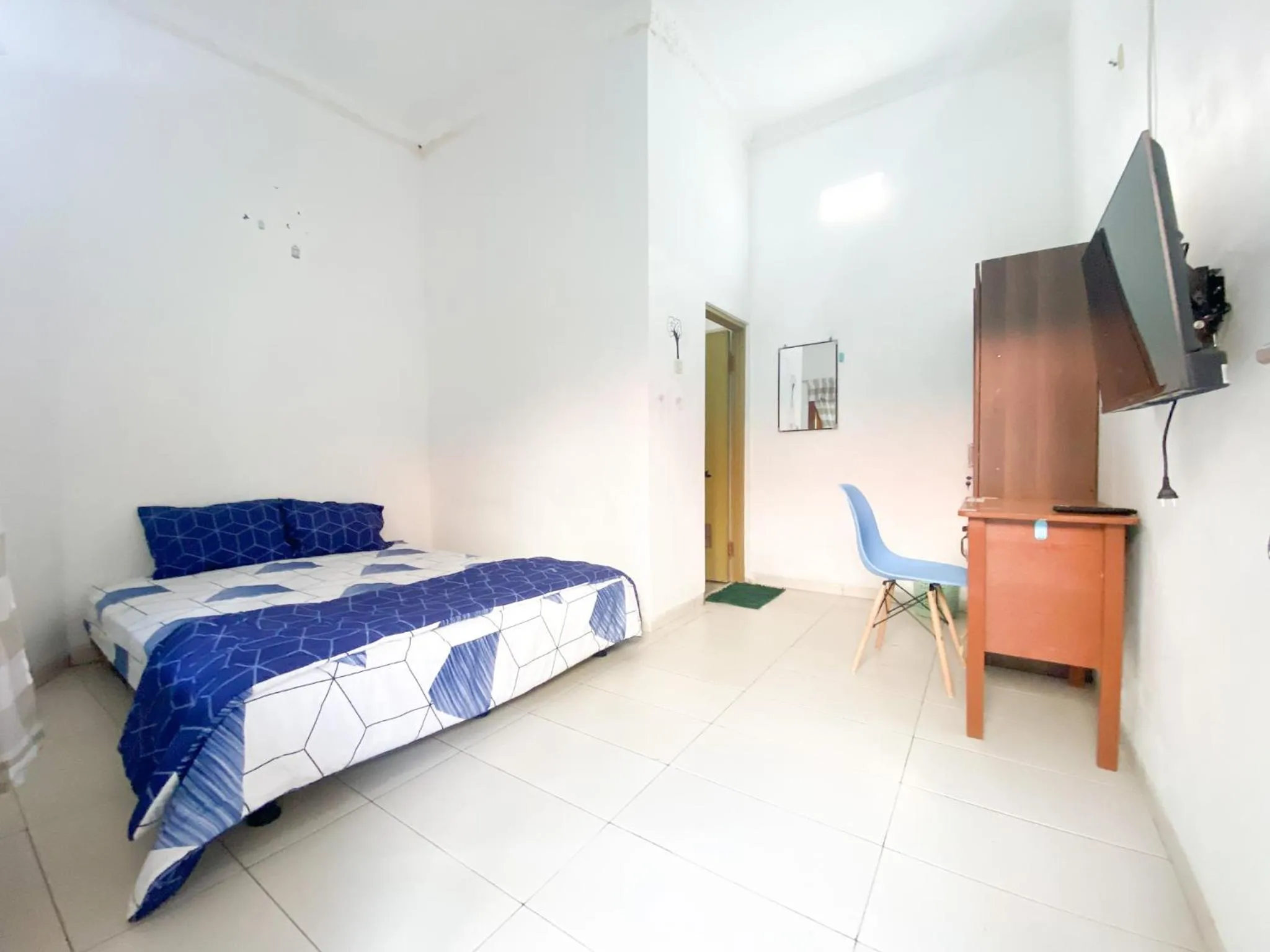 Bed in Homey Guesthouse Kertajaya (Syariah)