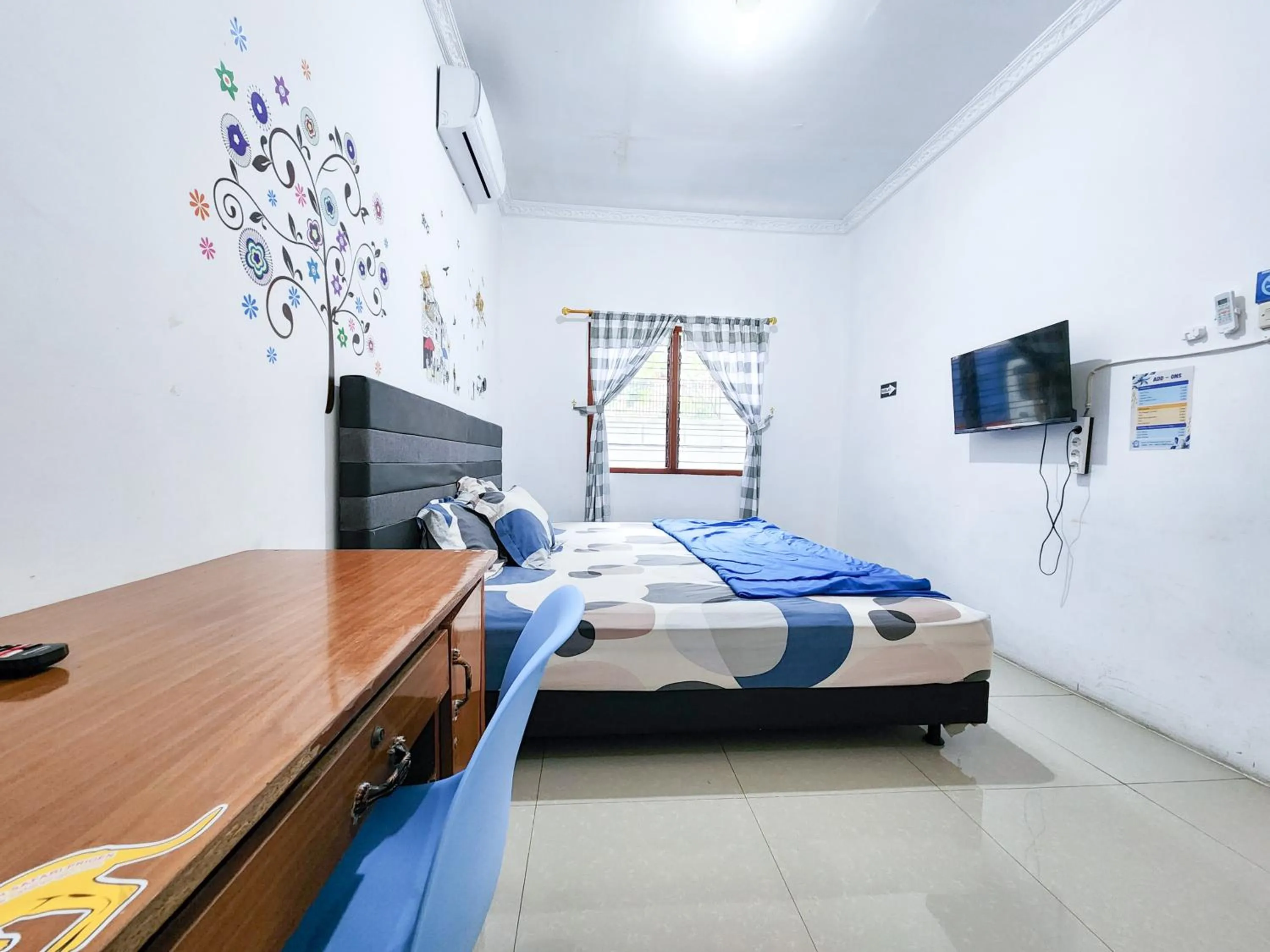 Bed in Homey Guesthouse Kertajaya (Syariah)