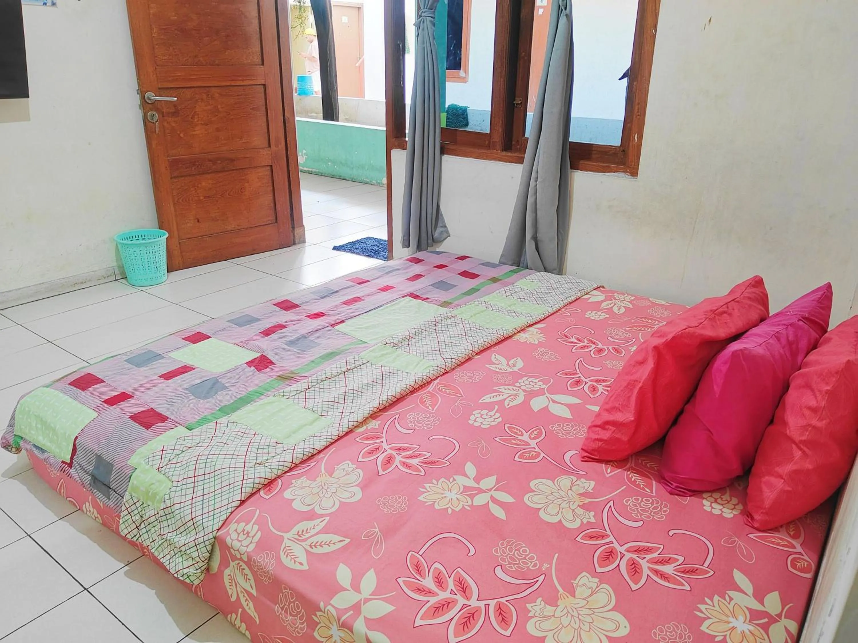 Bed in Homey Guesthouse Kertajaya (Syariah)
