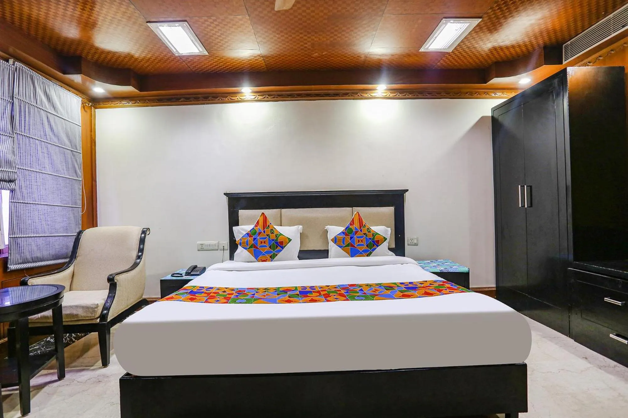Bed in FabHotel Blue Moon Home Stay