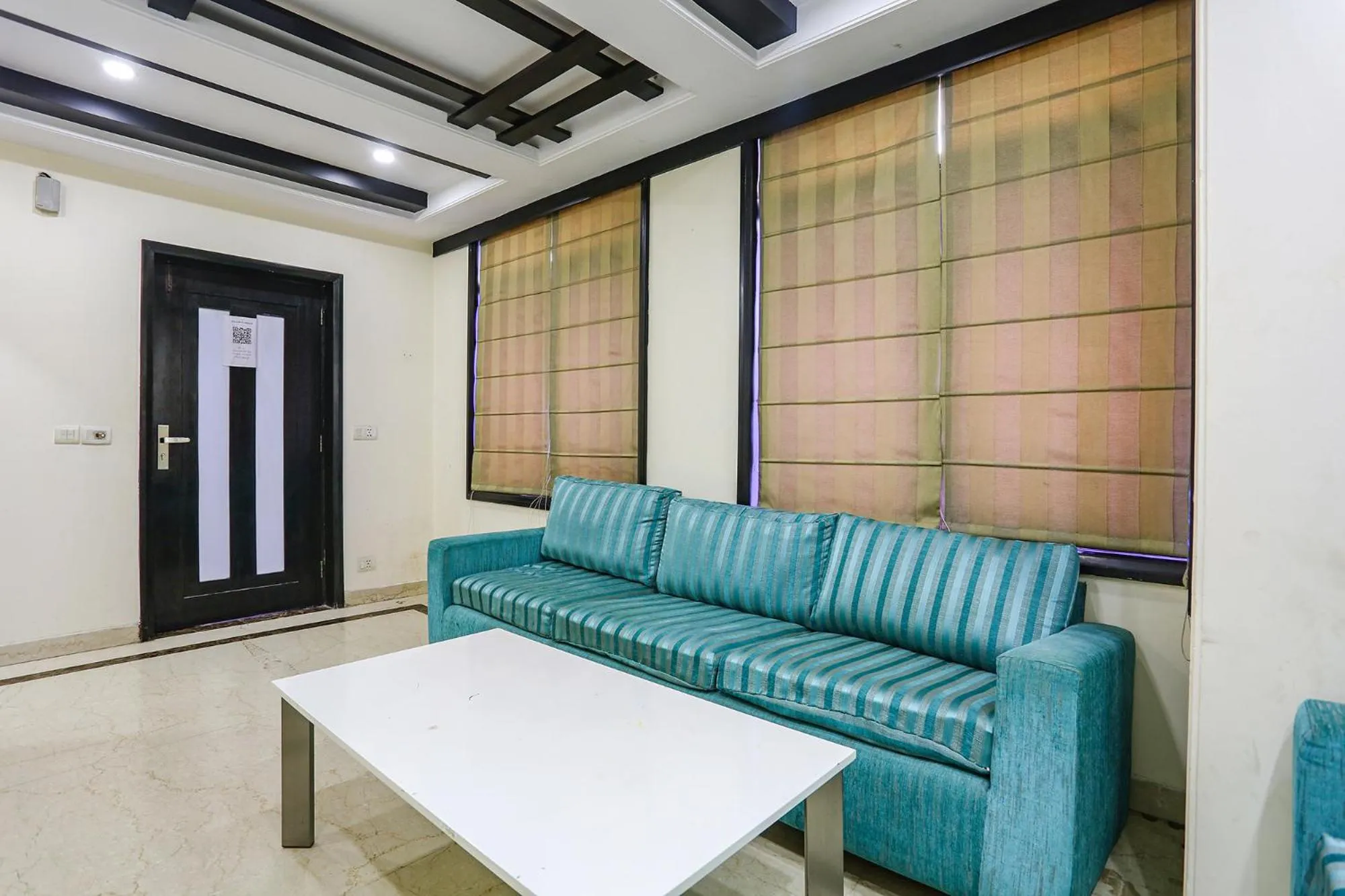 Seating area in FabHotel Blue Moon Home Stay