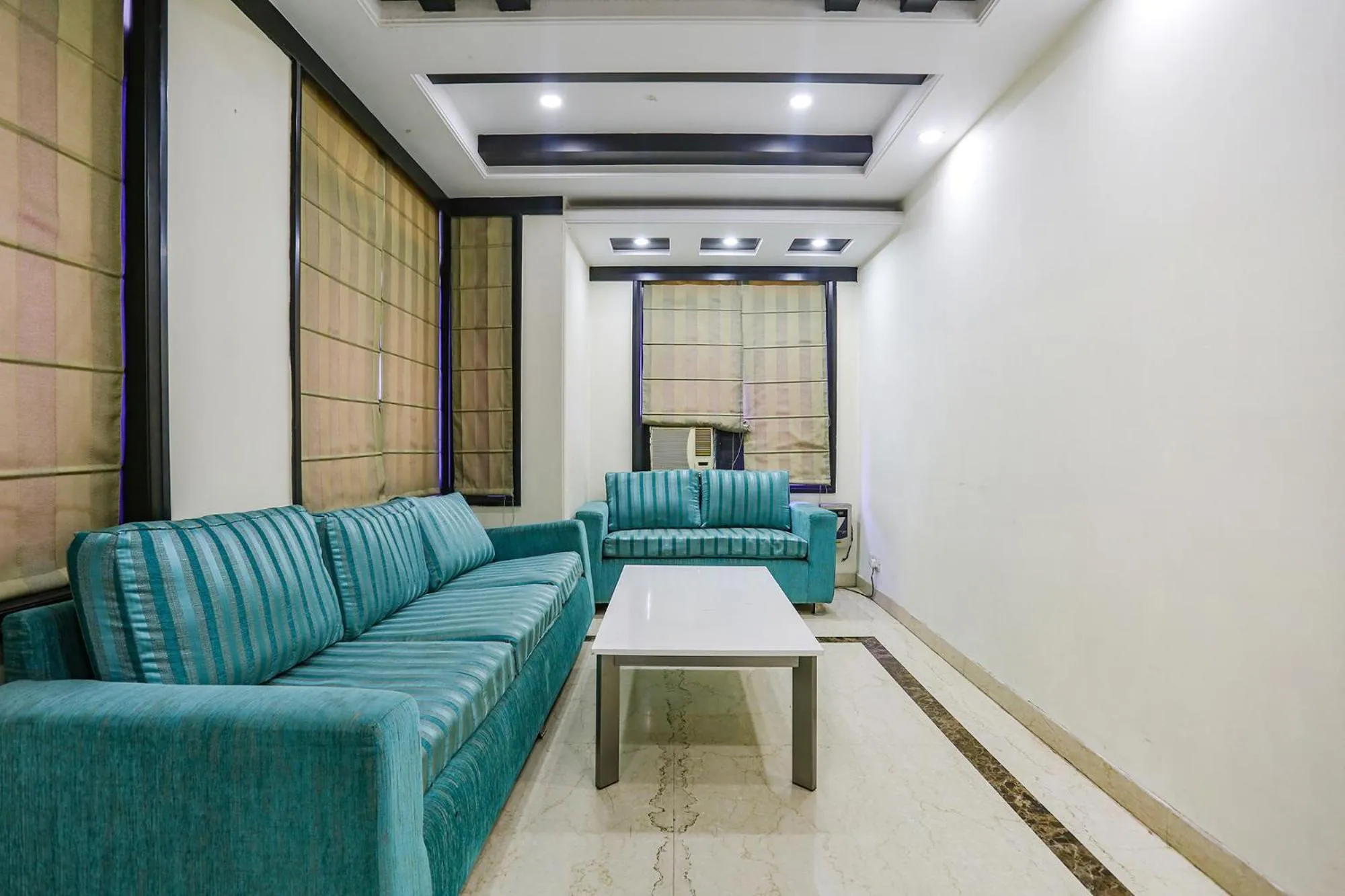 Seating area in FabHotel Blue Moon Home Stay