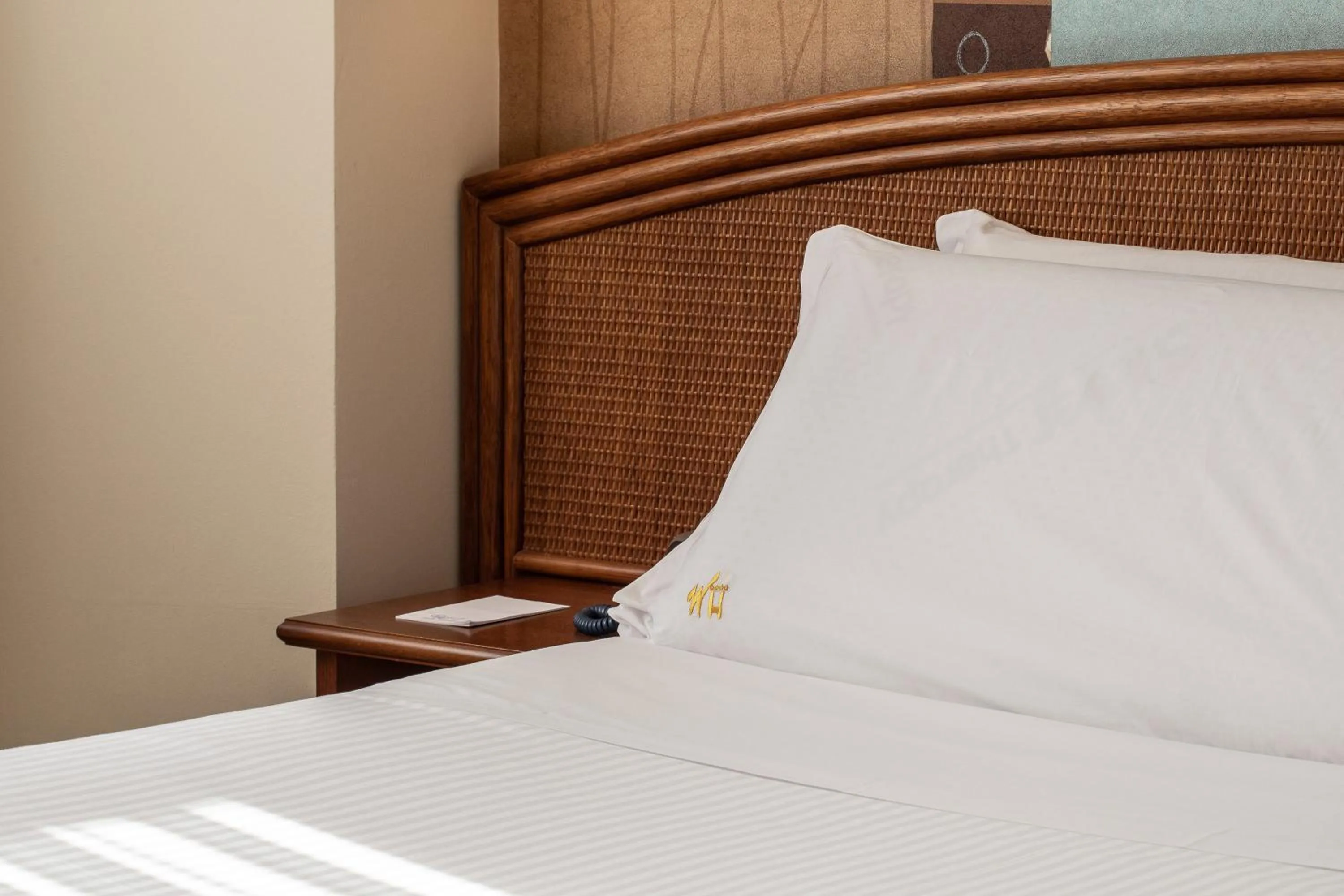 Bed in Welcome Hotel