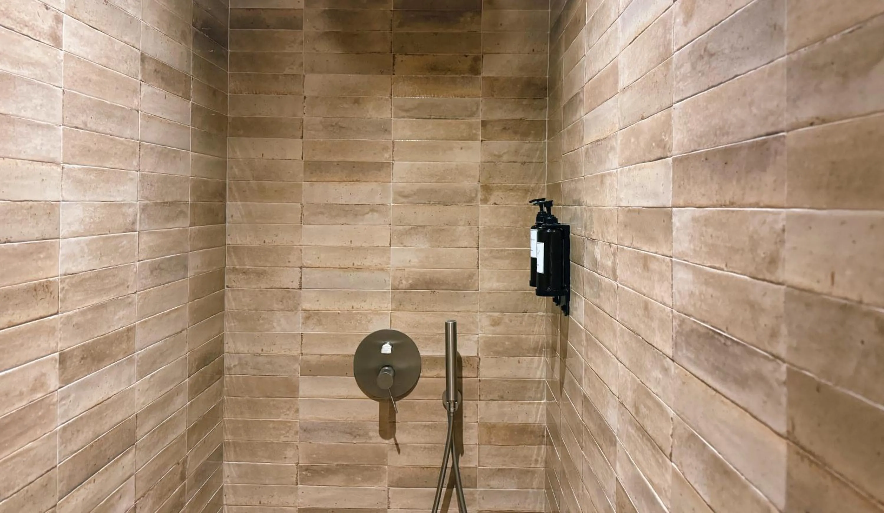 Shower in Comfy Studios Hotel