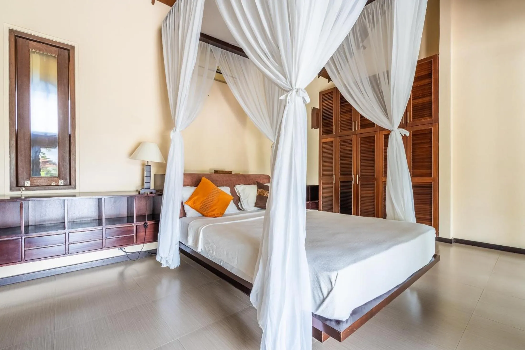 Bed in Tirta Tawar Villa Ubud