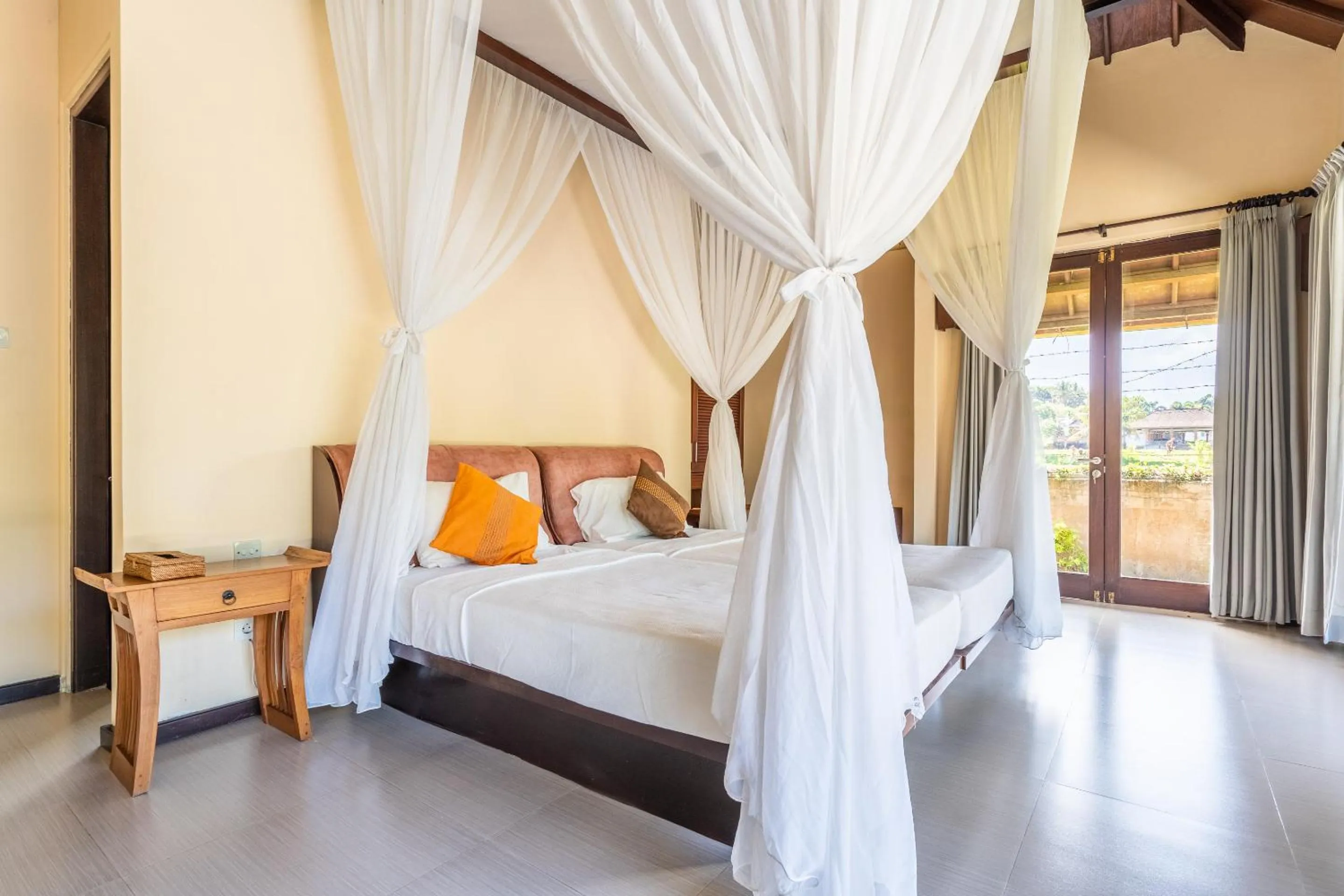 Bed in Tirta Tawar Villa Ubud
