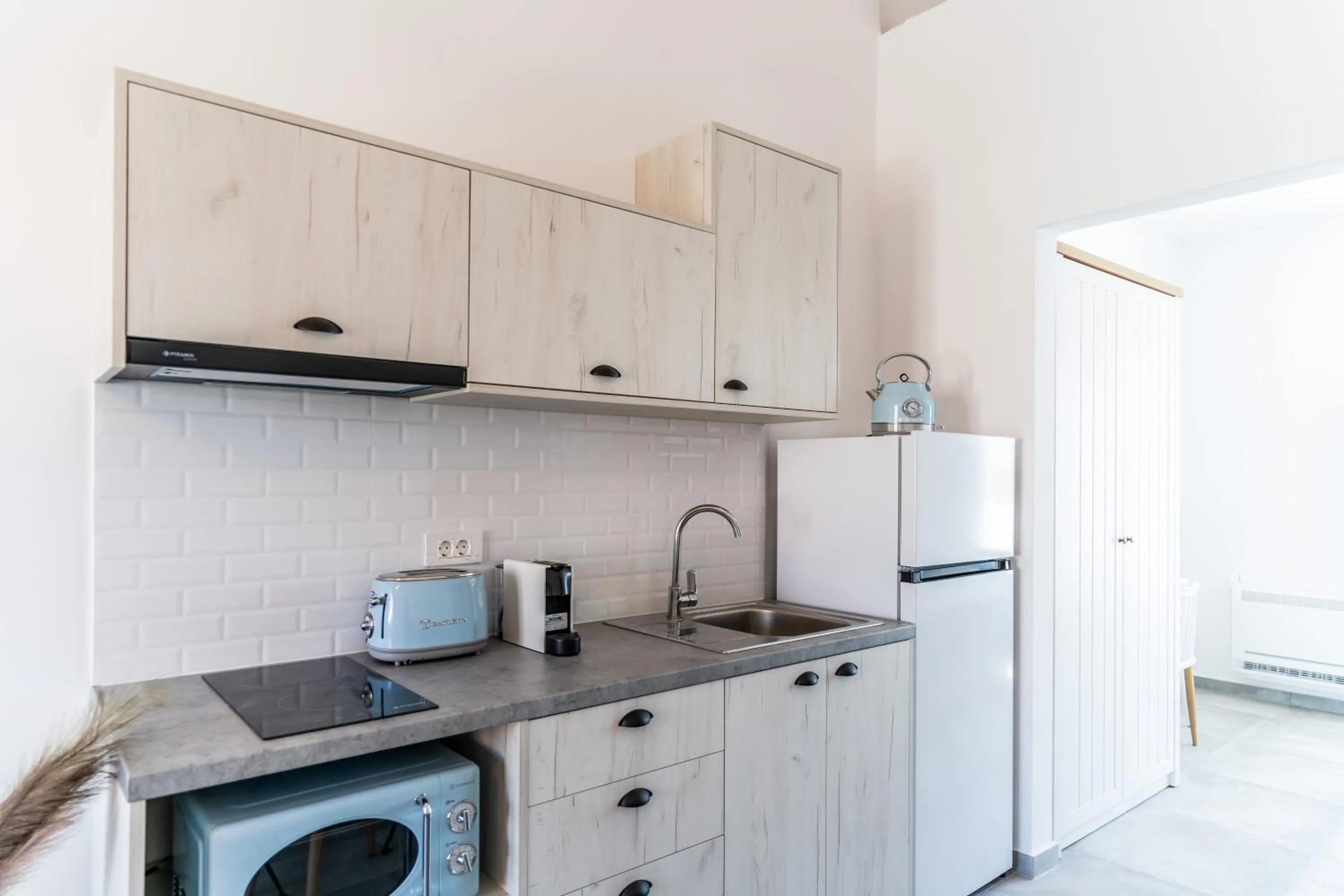 Kitchen or kitchenette in SantoRossa Luxury Villas