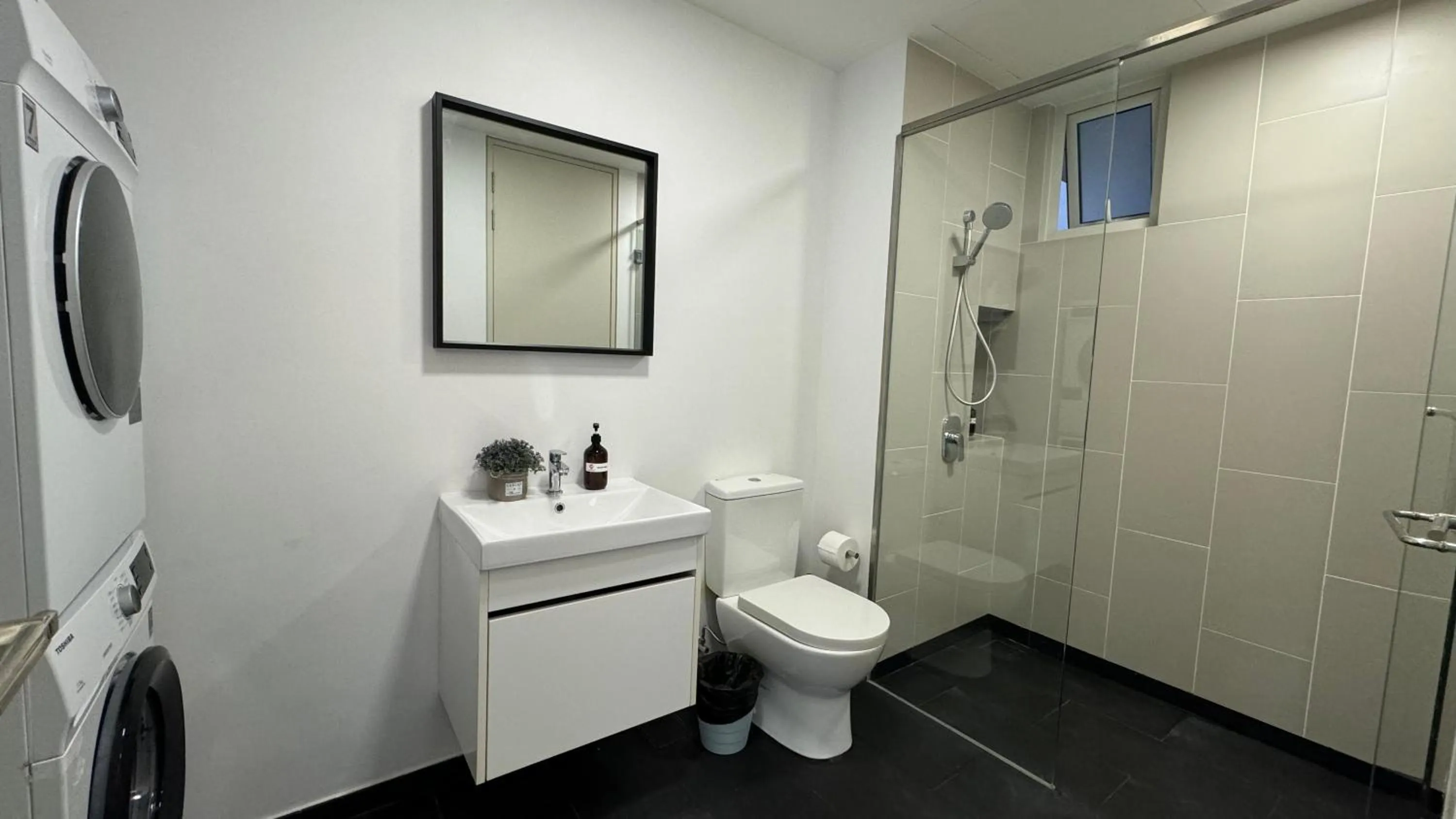 Shower in UNA Serviced Apartment by manatidur