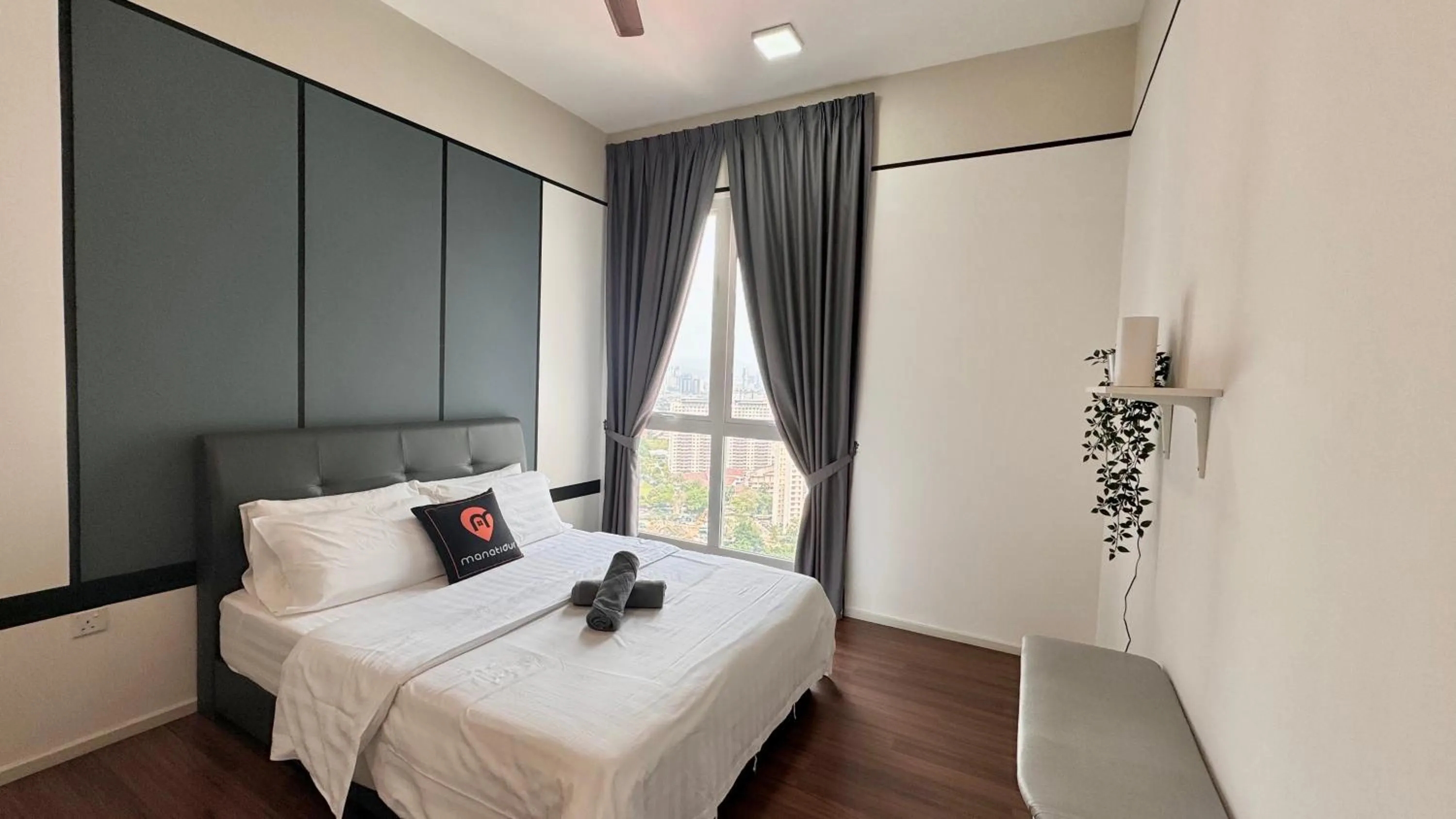 Bed in UNA Serviced Apartment by manatidur