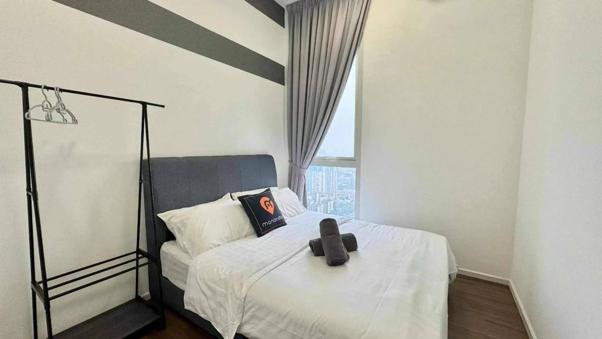 Bed in UNA Serviced Apartment by manatidur