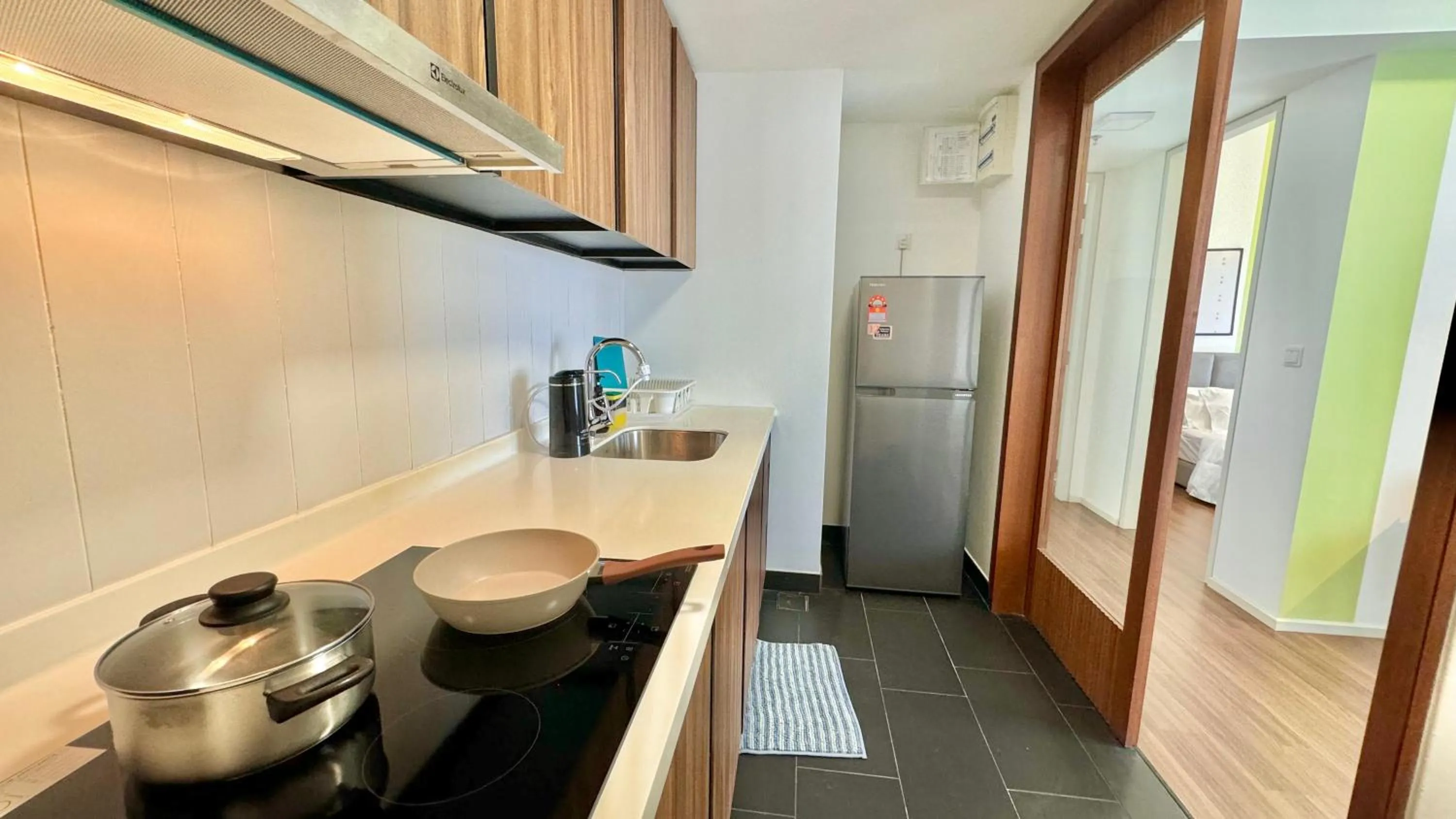 Kitchen or kitchenette in UNA Serviced Apartment by manatidur