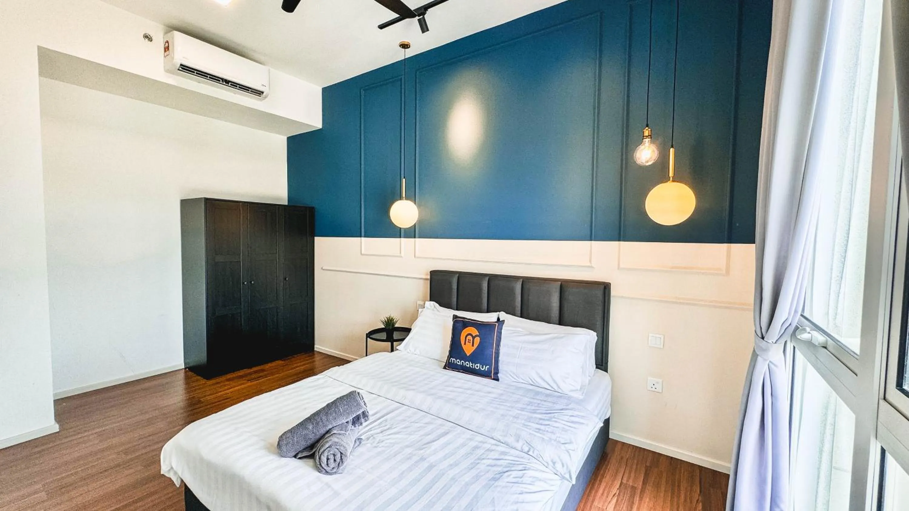 Bed in UNA Serviced Apartment by manatidur