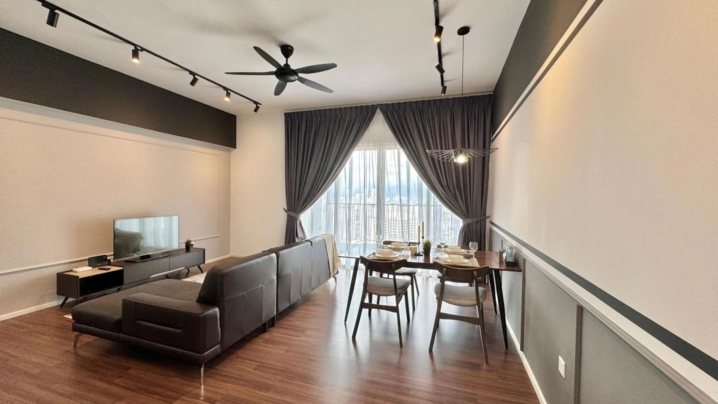 Living room in UNA Serviced Apartment by manatidur