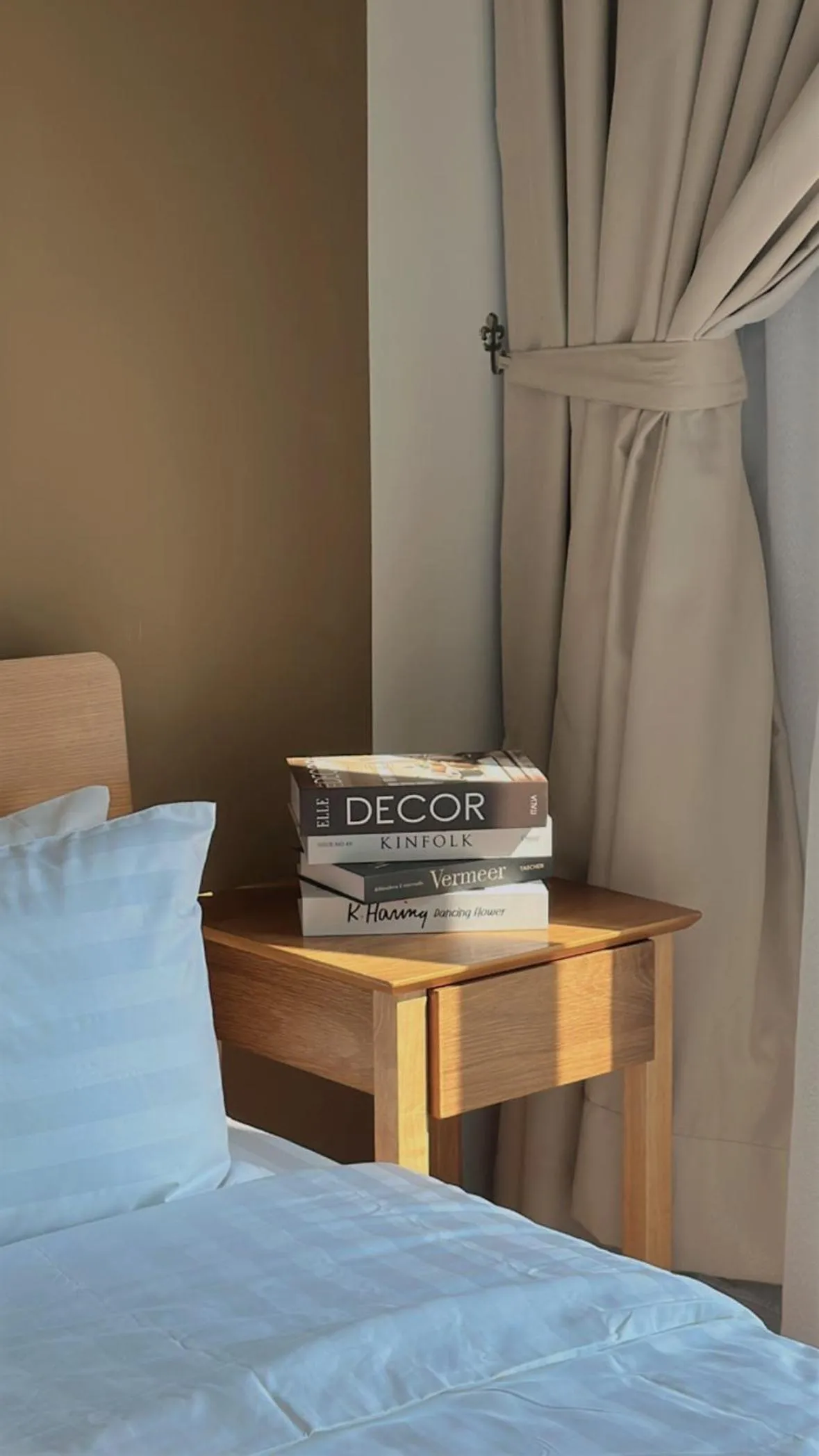 Decorative detail, Bed in UNA Serviced Apartment by manatidur