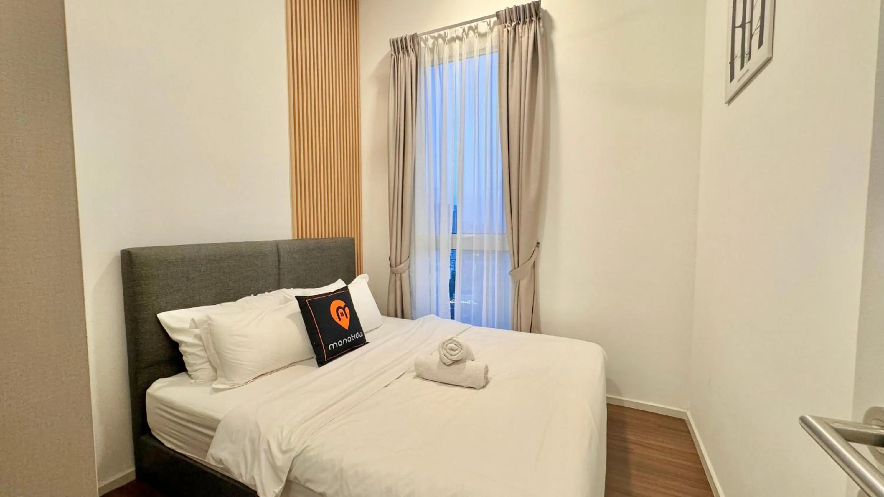 Bed in UNA Serviced Apartment by manatidur