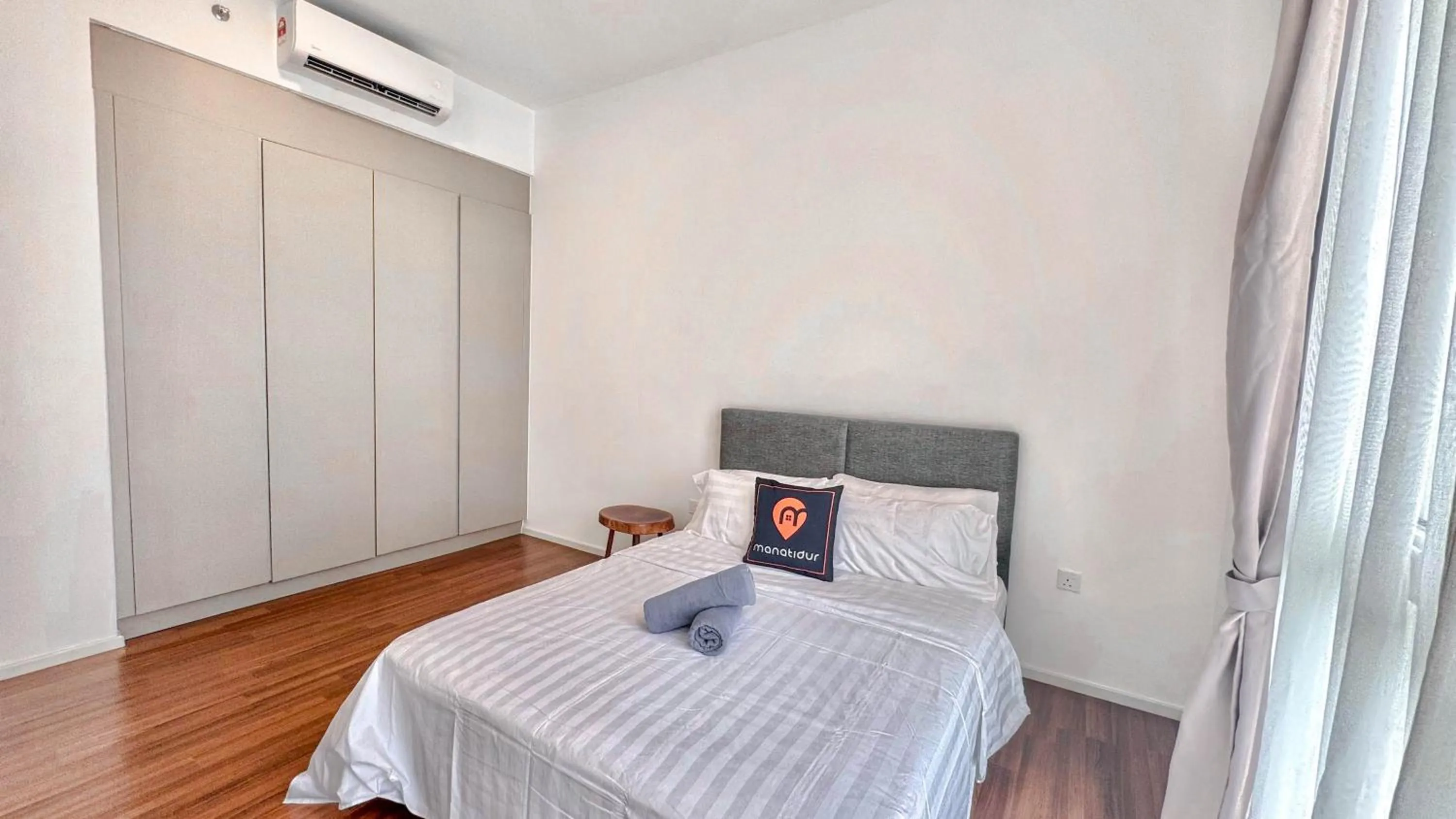 Bed in UNA Serviced Apartment by manatidur