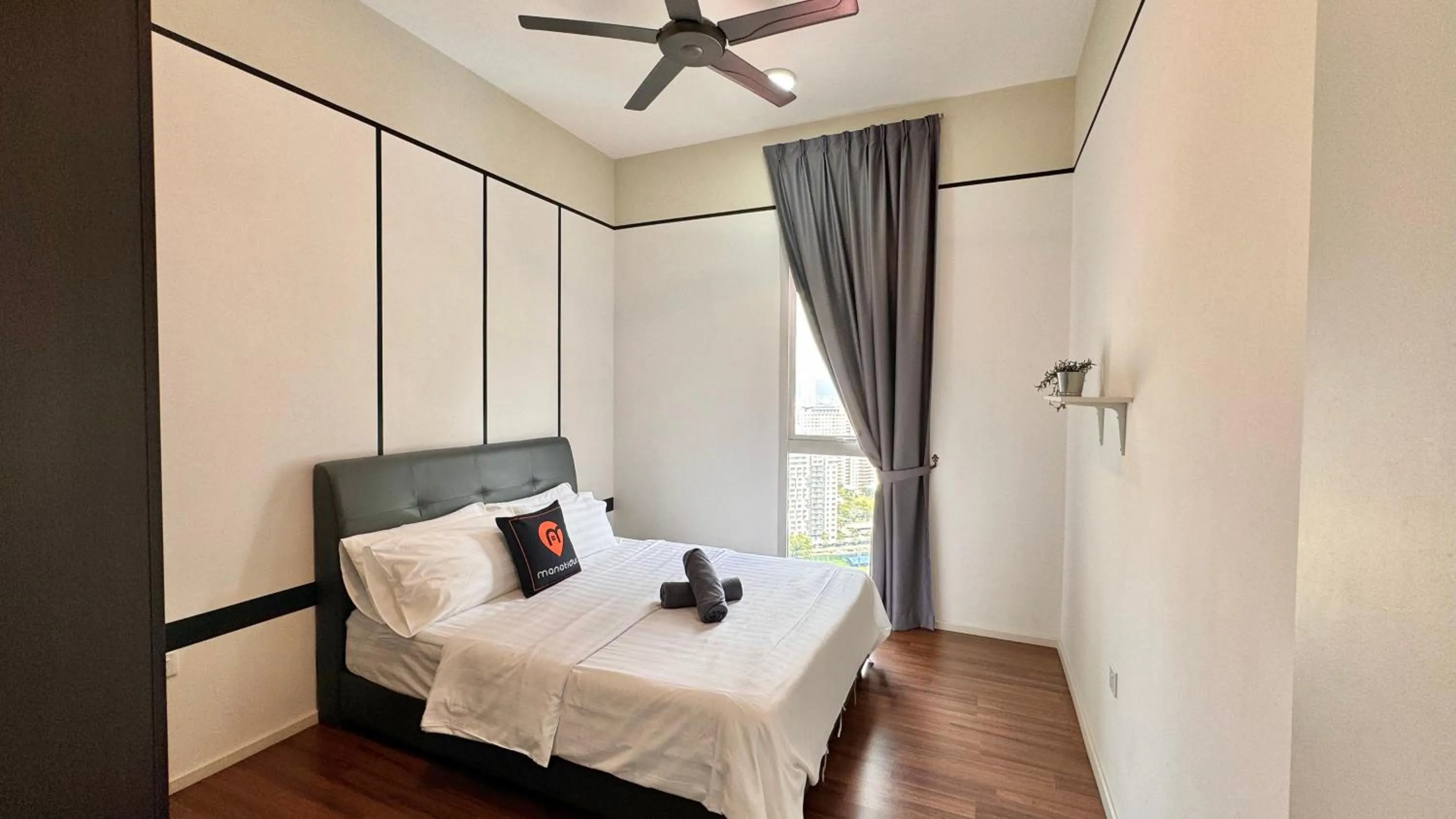Bed in UNA Serviced Apartment by manatidur