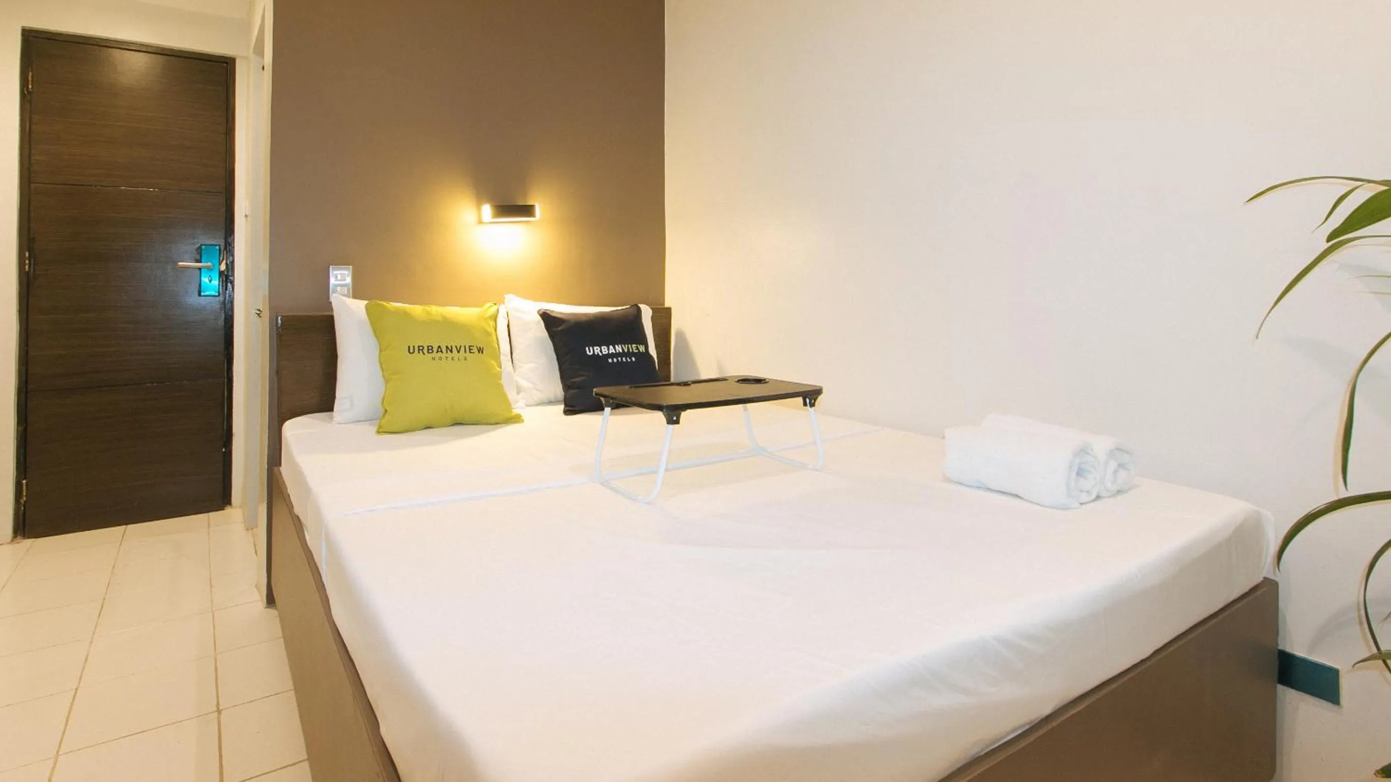 Photo of the whole room, Bed in UrbanView at San Antonio's Place Sampaloc Manila