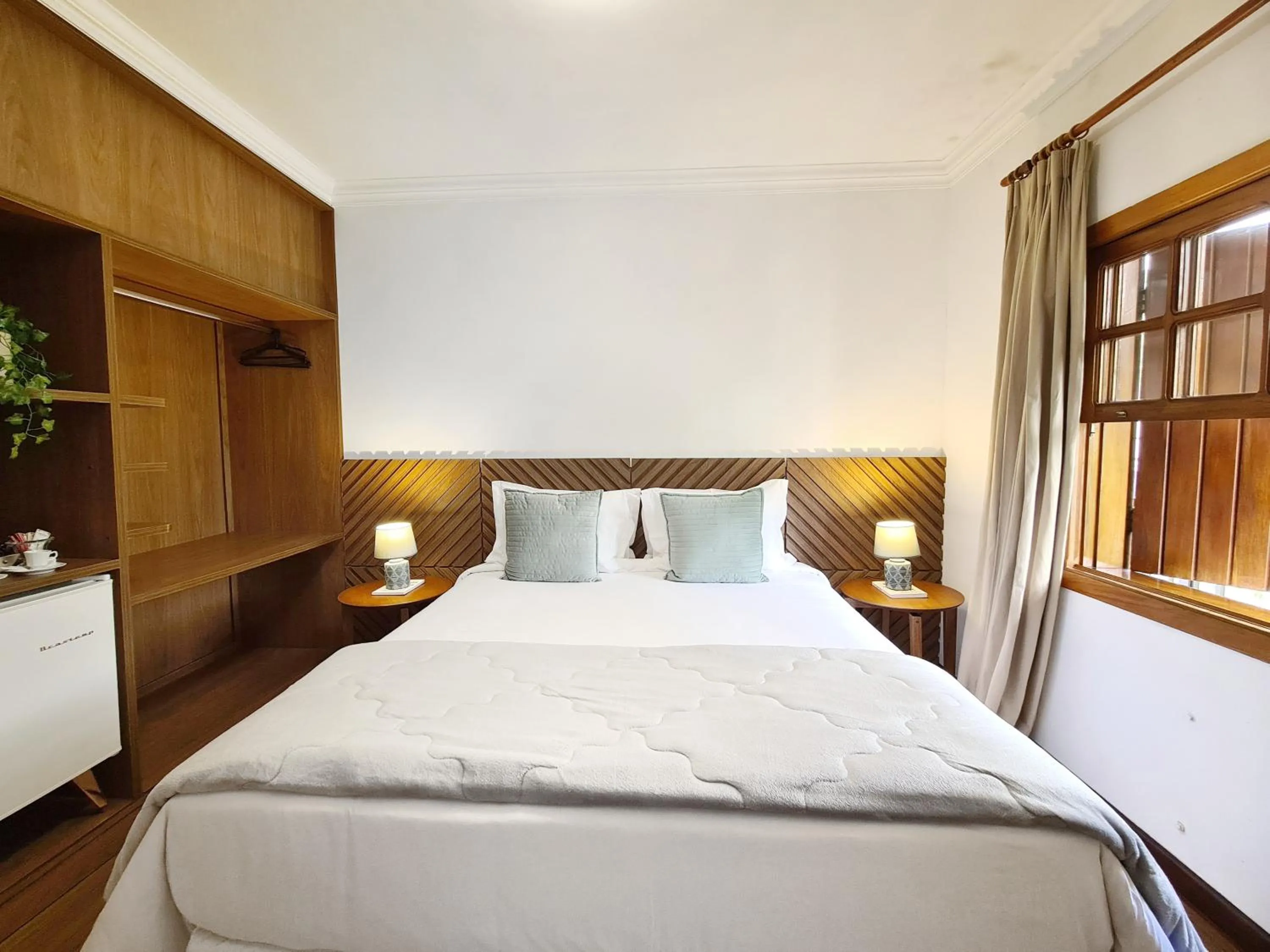 Photo of the whole room, Bed in Casa Três Rios - Campos do Jordão