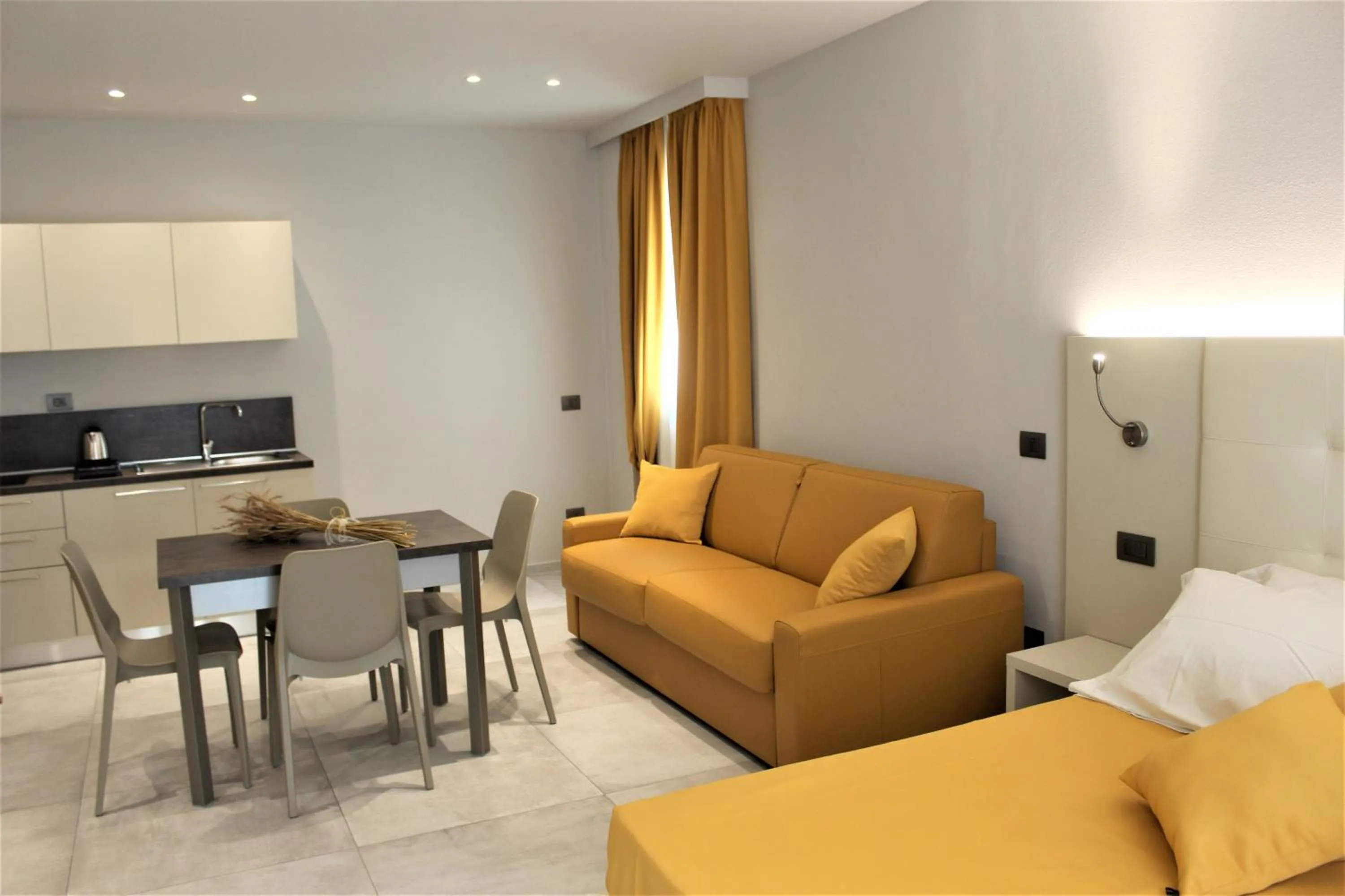 Kitchen or kitchenette in B&B Primrose Residence Hotel