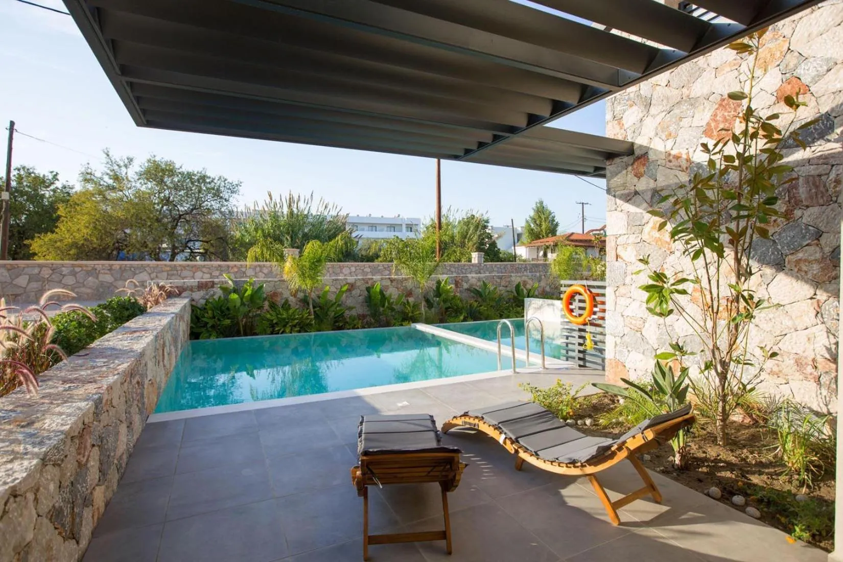 Swimming pool in DeLight Luxury Rooms