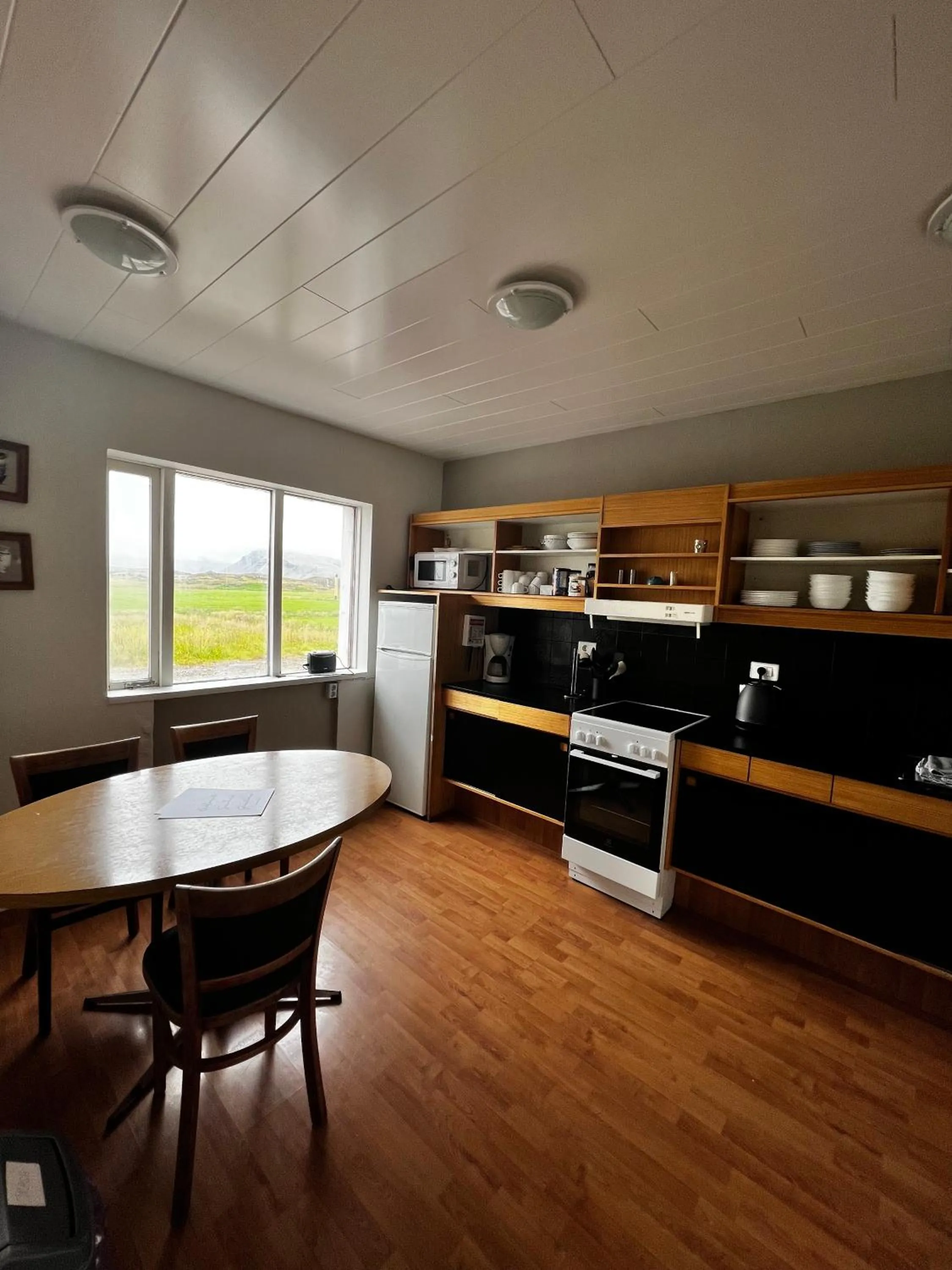 Kitchen or kitchenette in Sauðanes Guesthouse