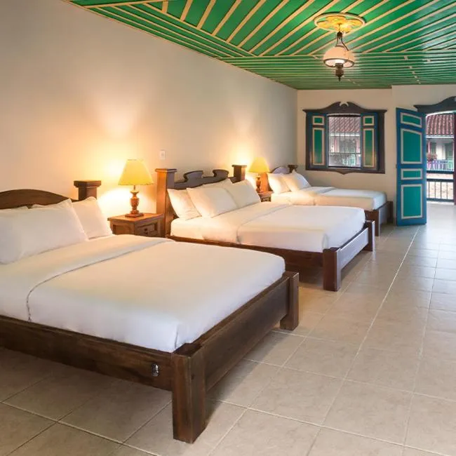 Bed in Decameron Las Heliconias - All Inclusive
