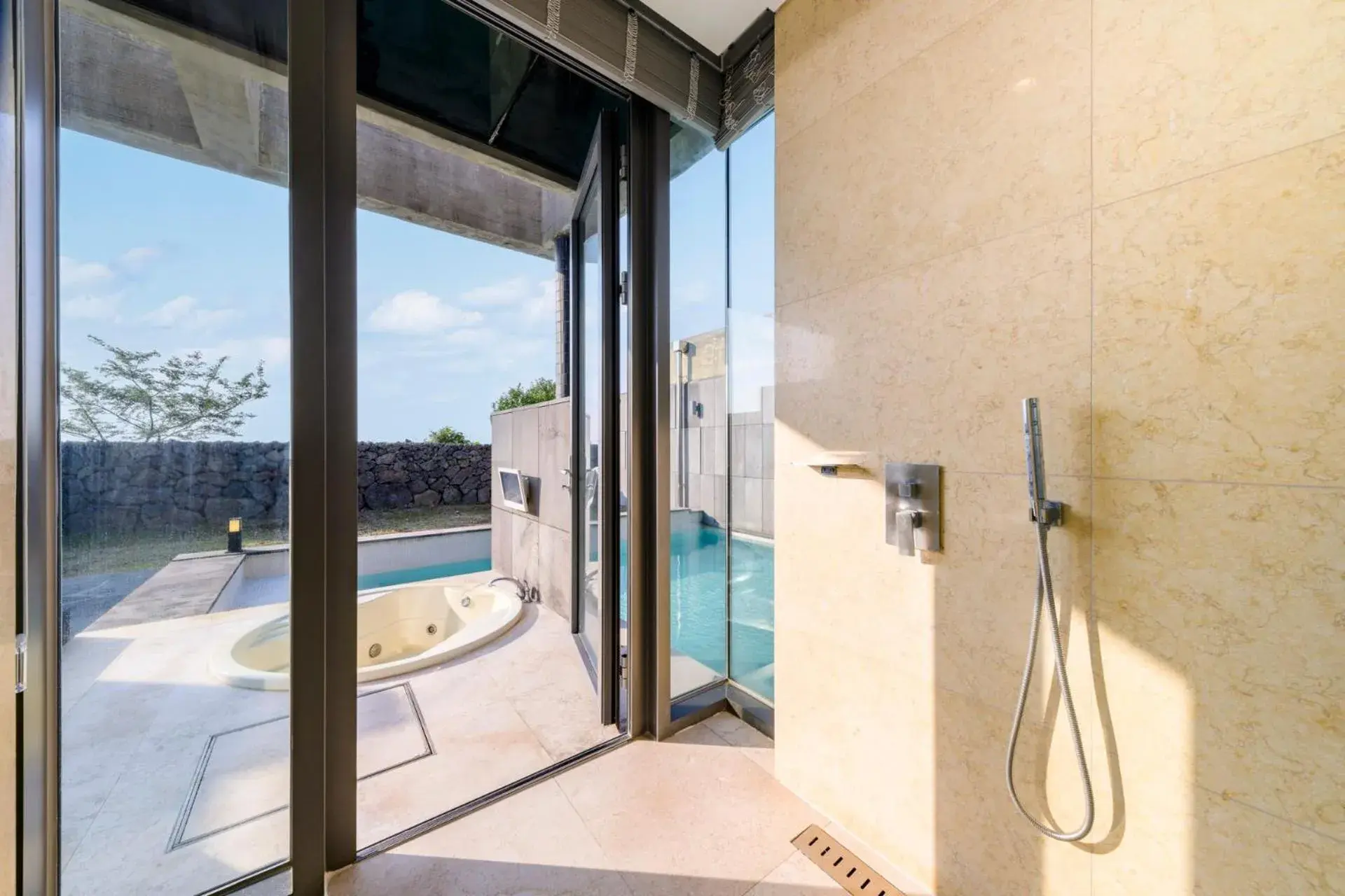 Pool view in STANFORD Hotel & Resort Jeju Pool view in STANFORD Hotel & Resort Jeju