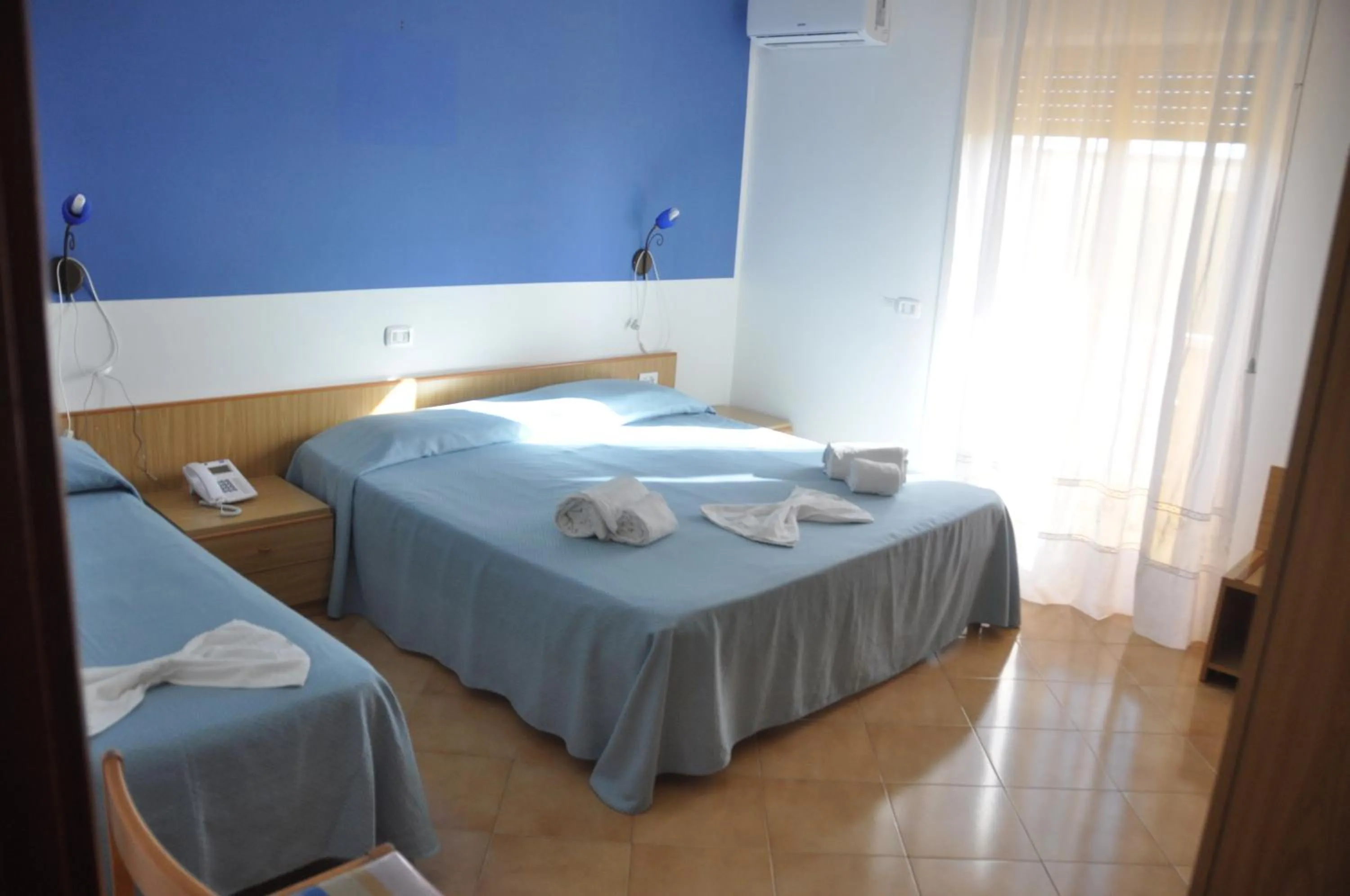 Bed in Hotel Le Pelagie