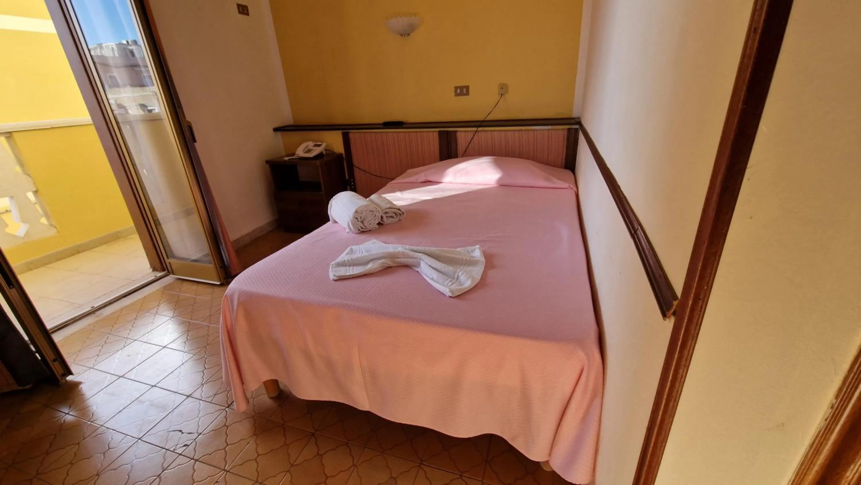 Bed in Hotel Le Pelagie