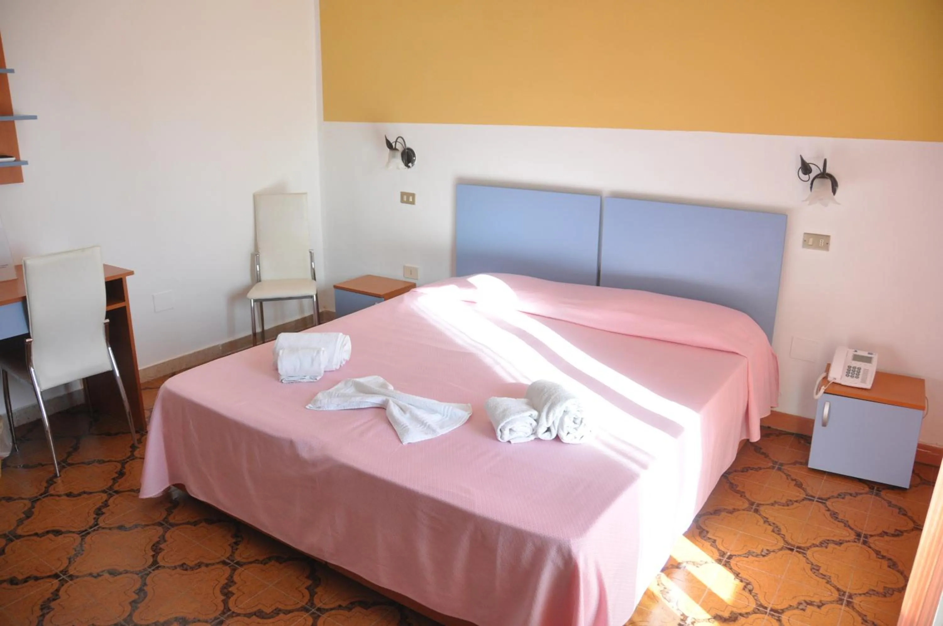Bed in Hotel Le Pelagie