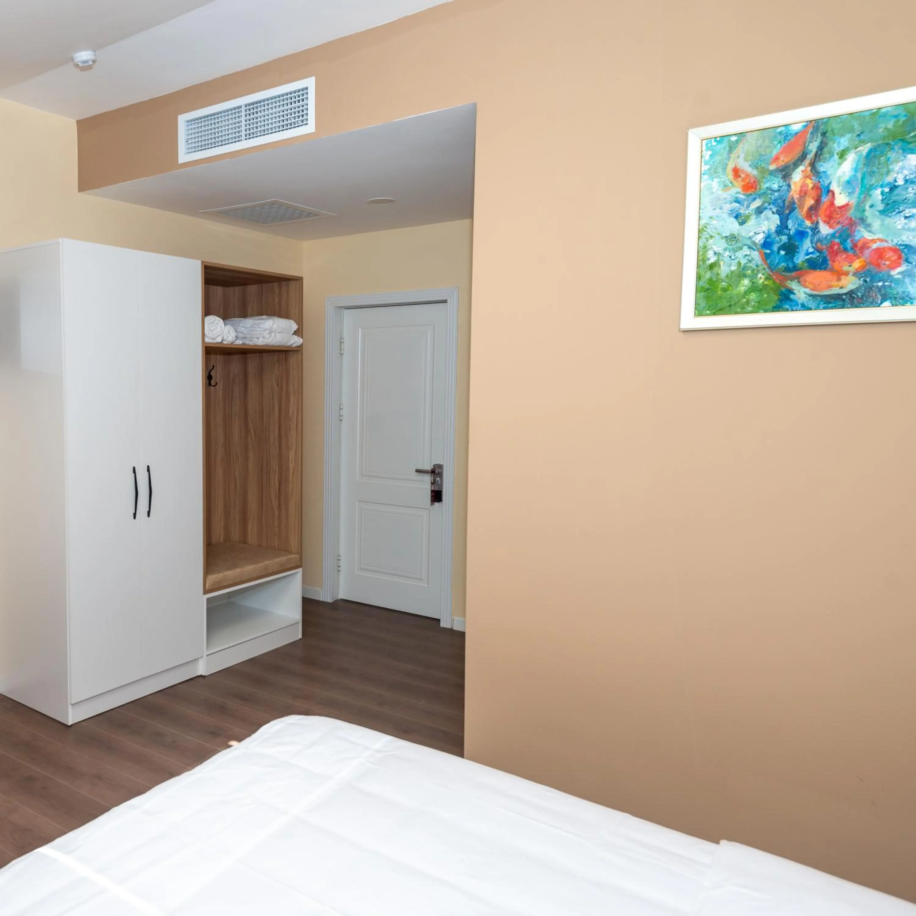 wardrobe, Bed in OLF Hotel