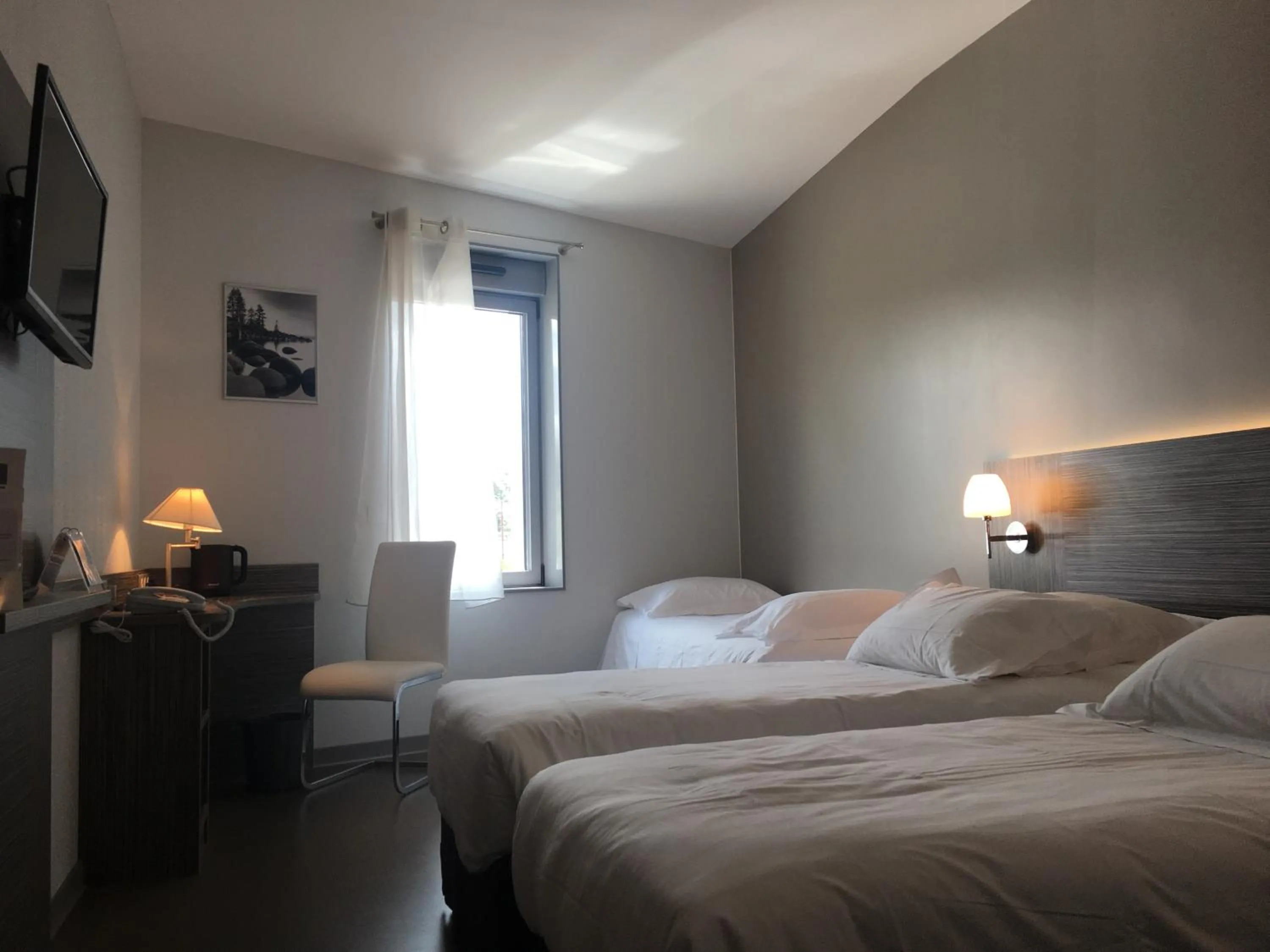 Photo of the whole room, Bed in Kyriad Saint Chély d'Apcher - Aire de la Lozère