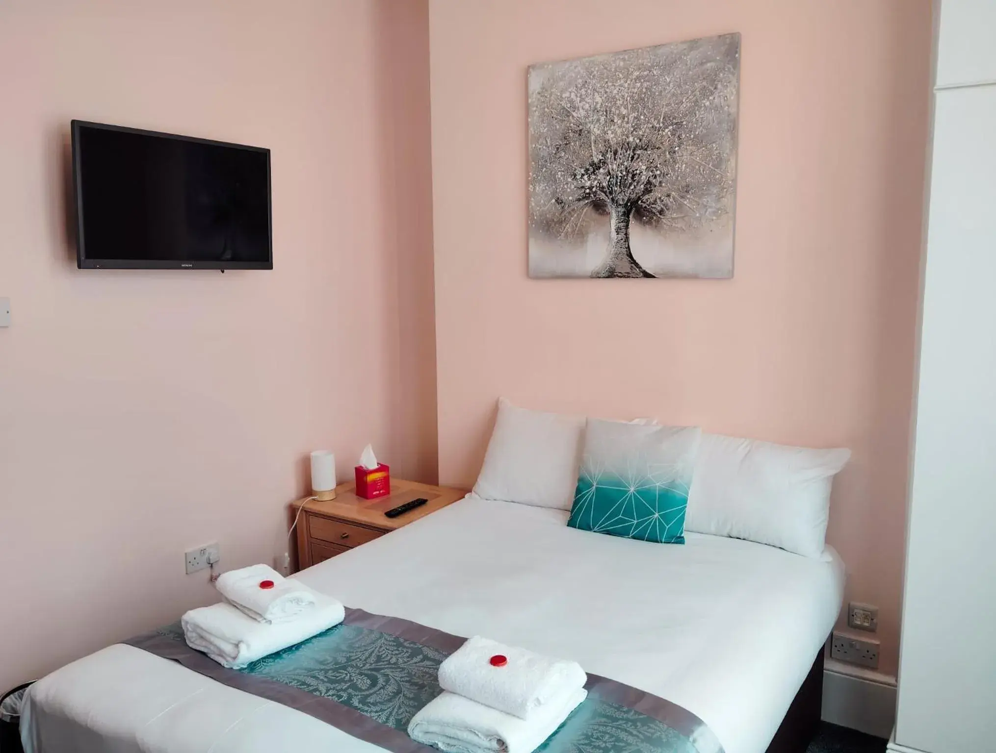 Bed in United Lodge Hotel Bed in United Lodge Hotel