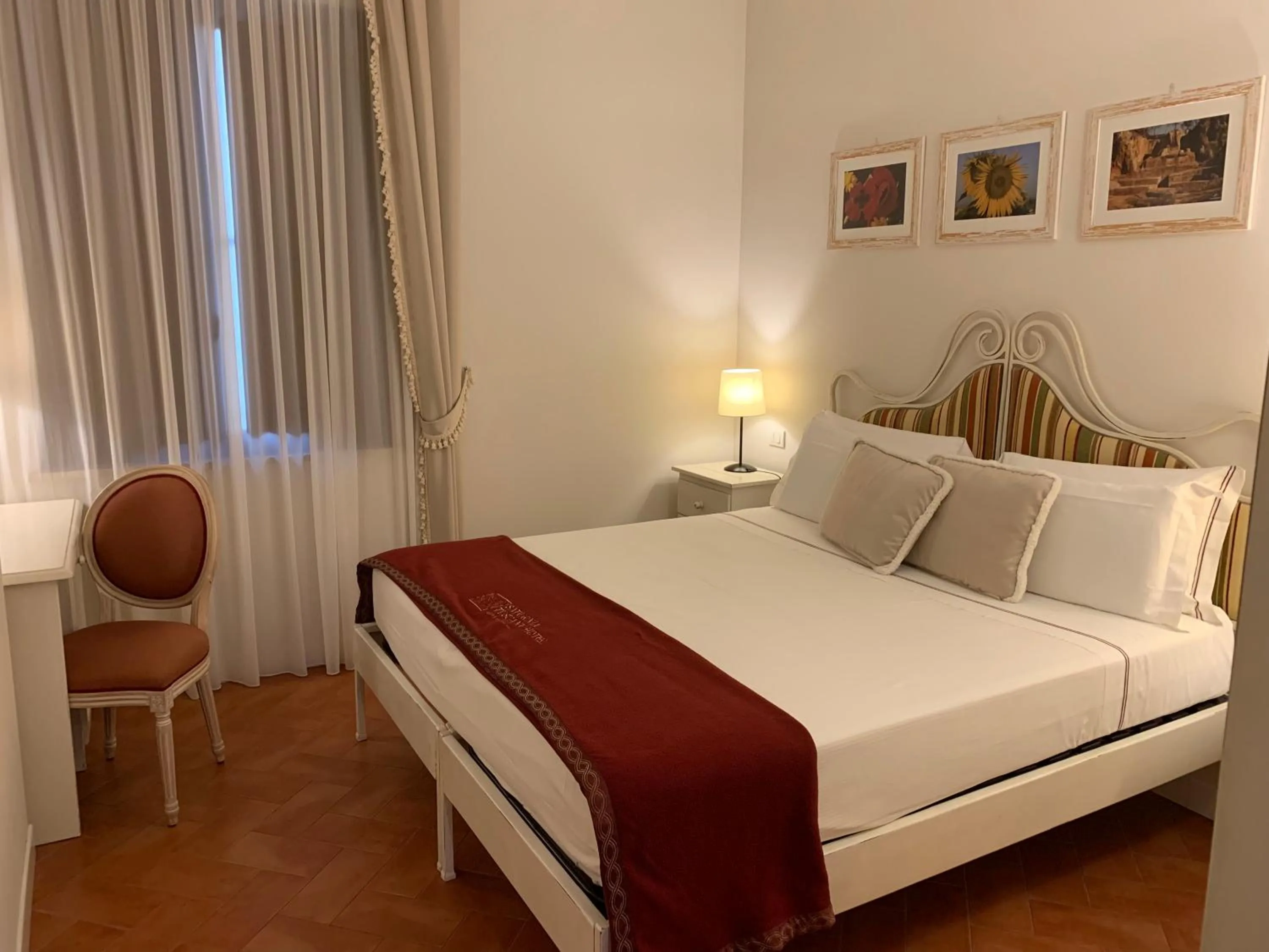 Photo of the whole room, Bed in Saturnia Tuscany Hotel