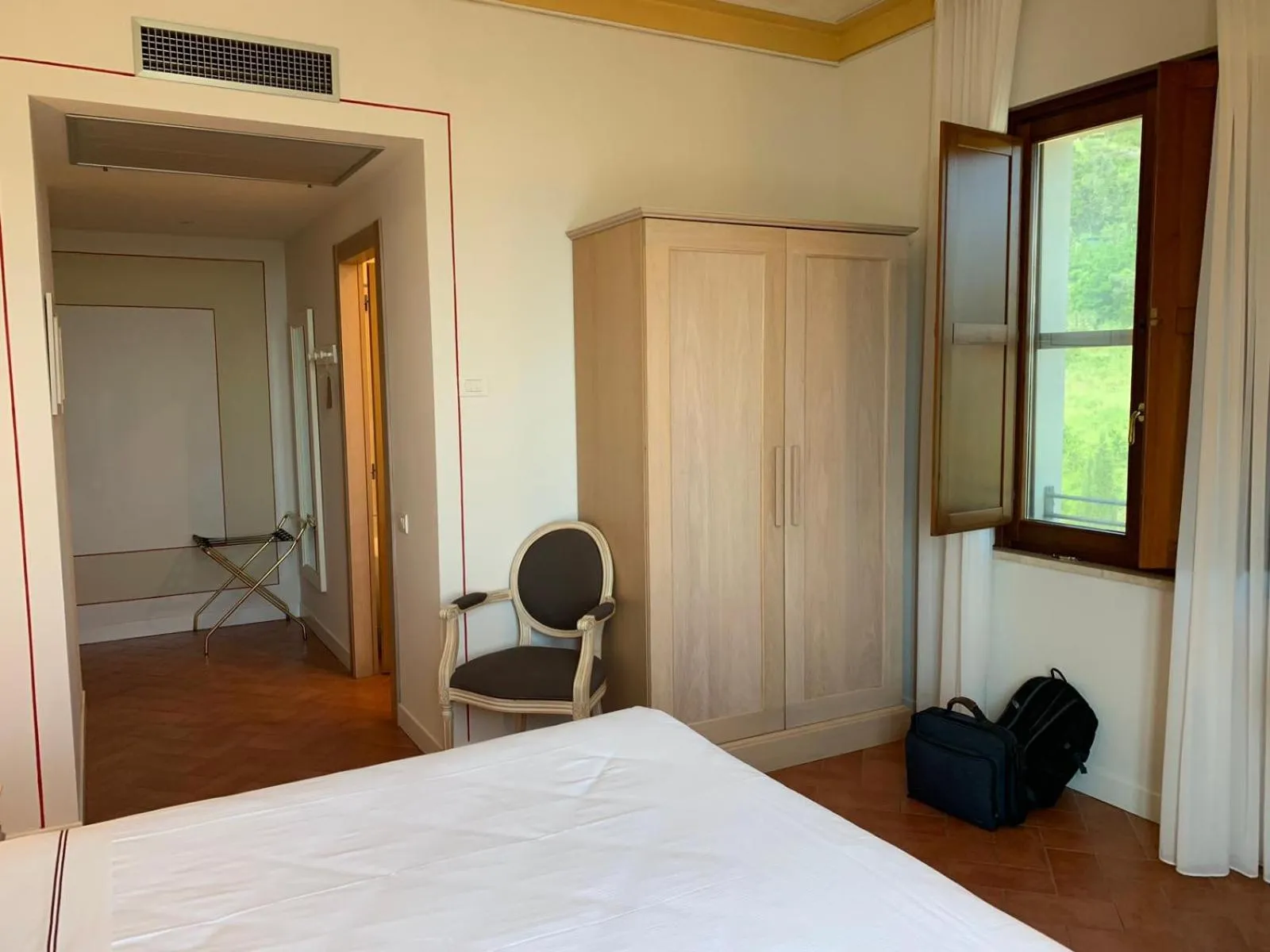 Bed in Saturnia Tuscany Hotel