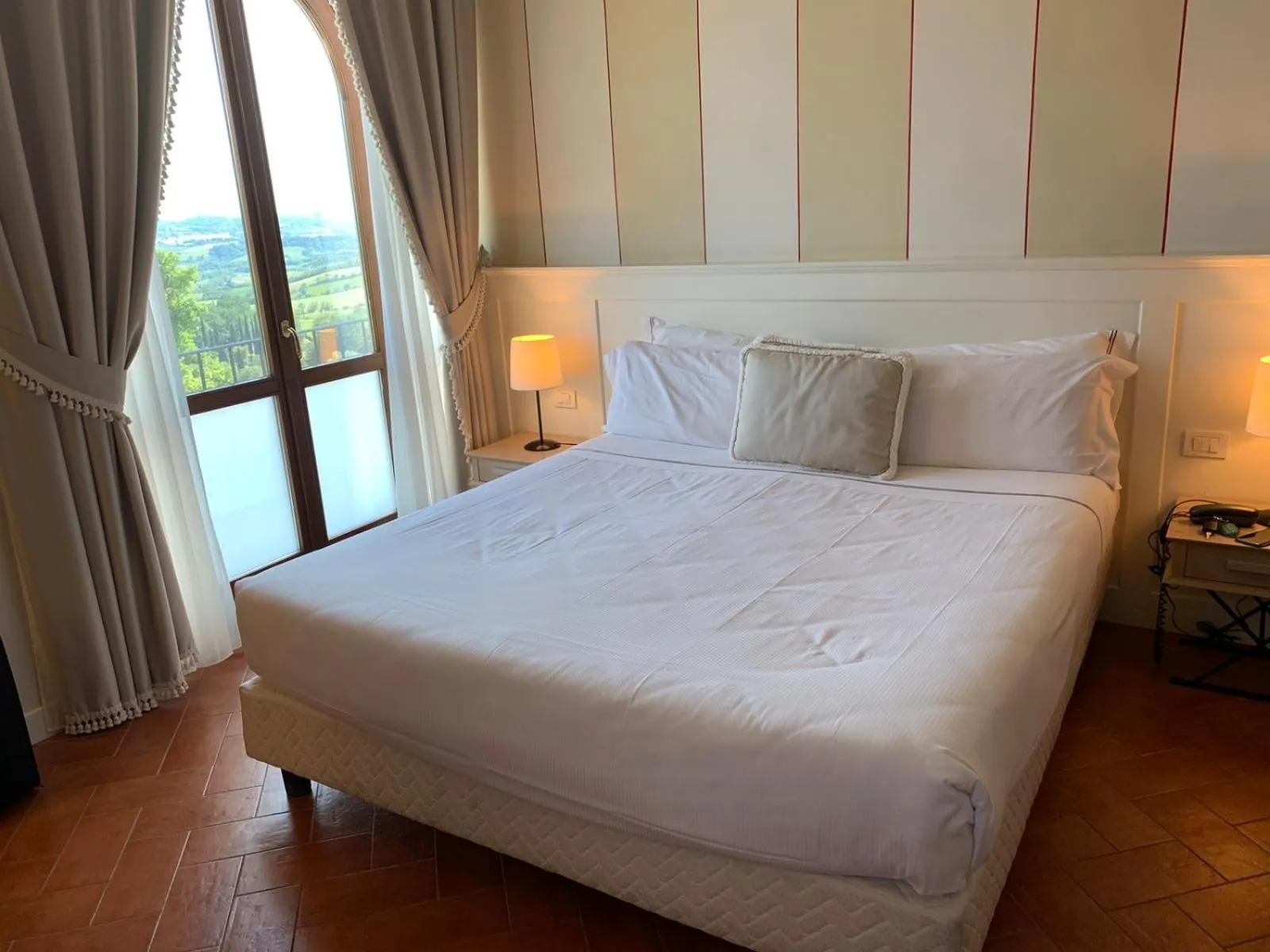 Bed in Saturnia Tuscany Hotel