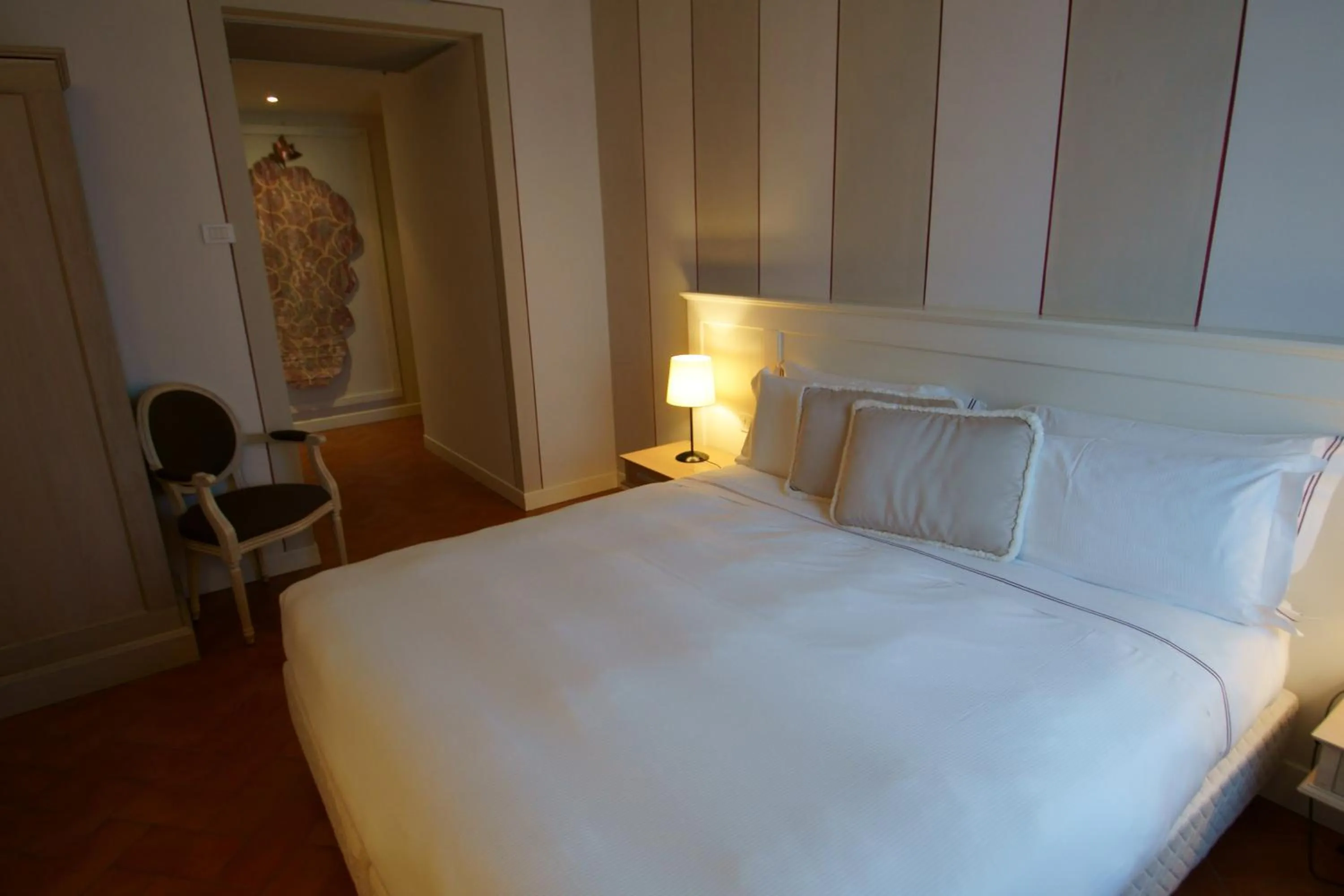 Bed in Saturnia Tuscany Hotel