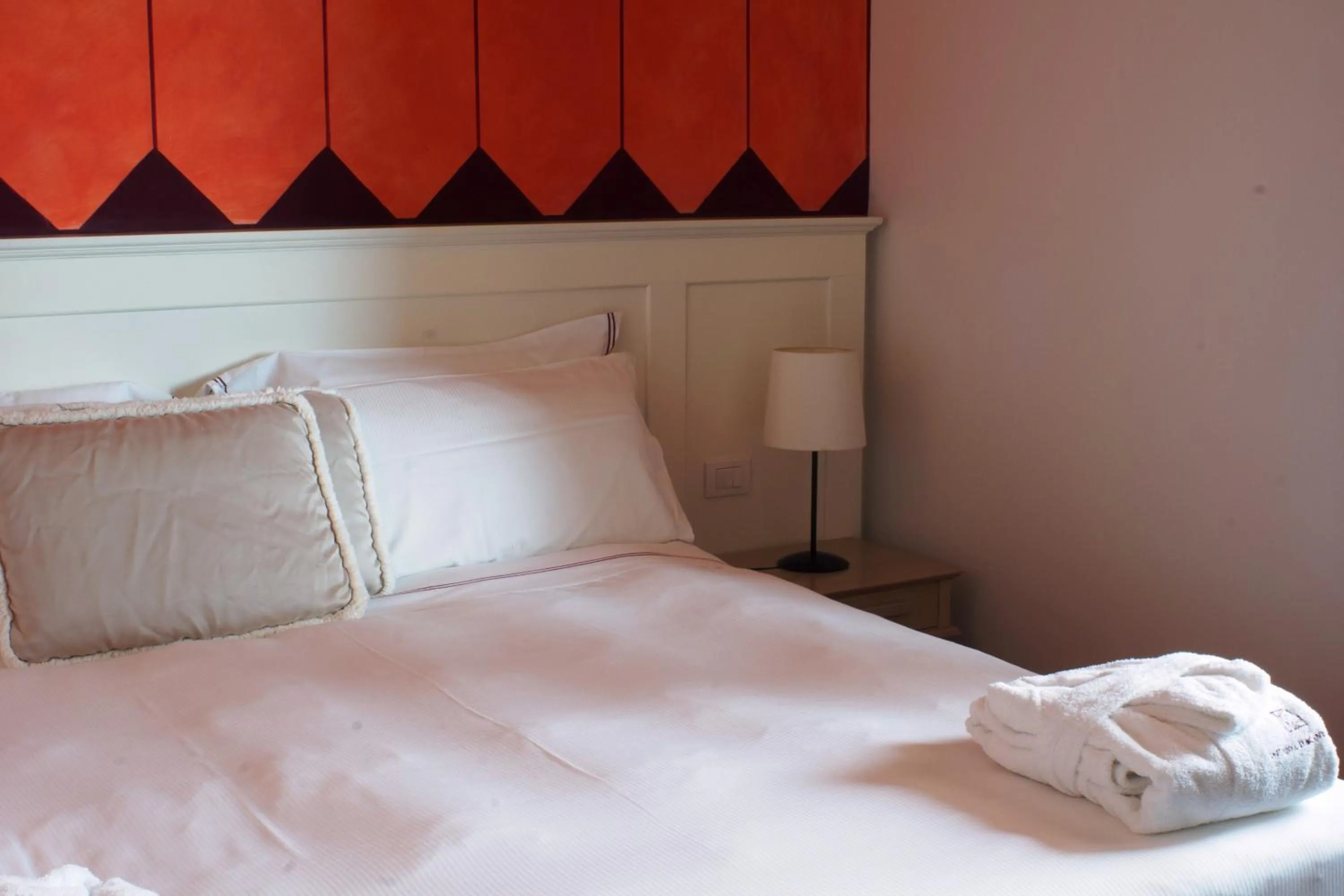 Bed in Saturnia Tuscany Hotel