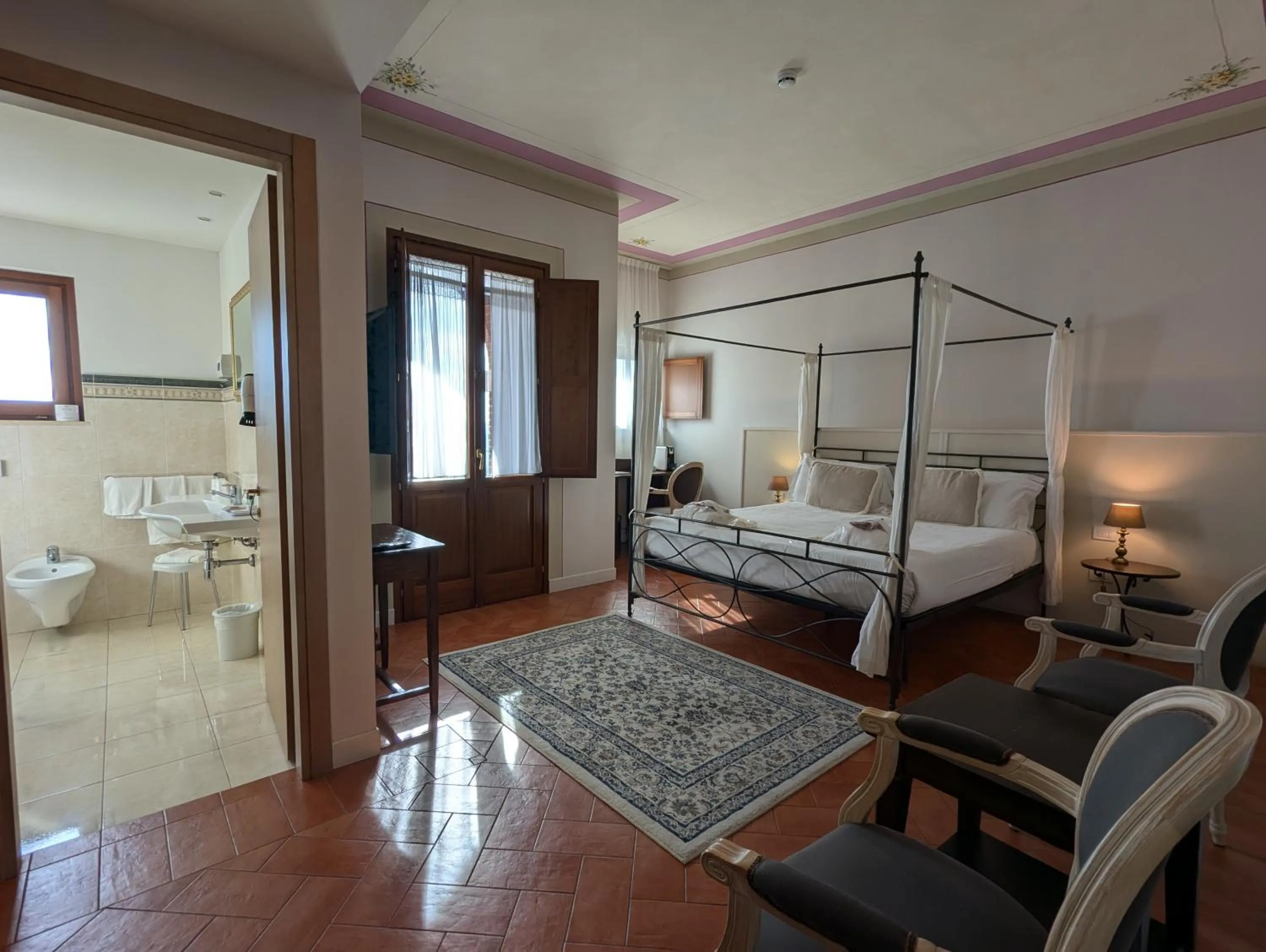 Bed in Saturnia Tuscany Hotel