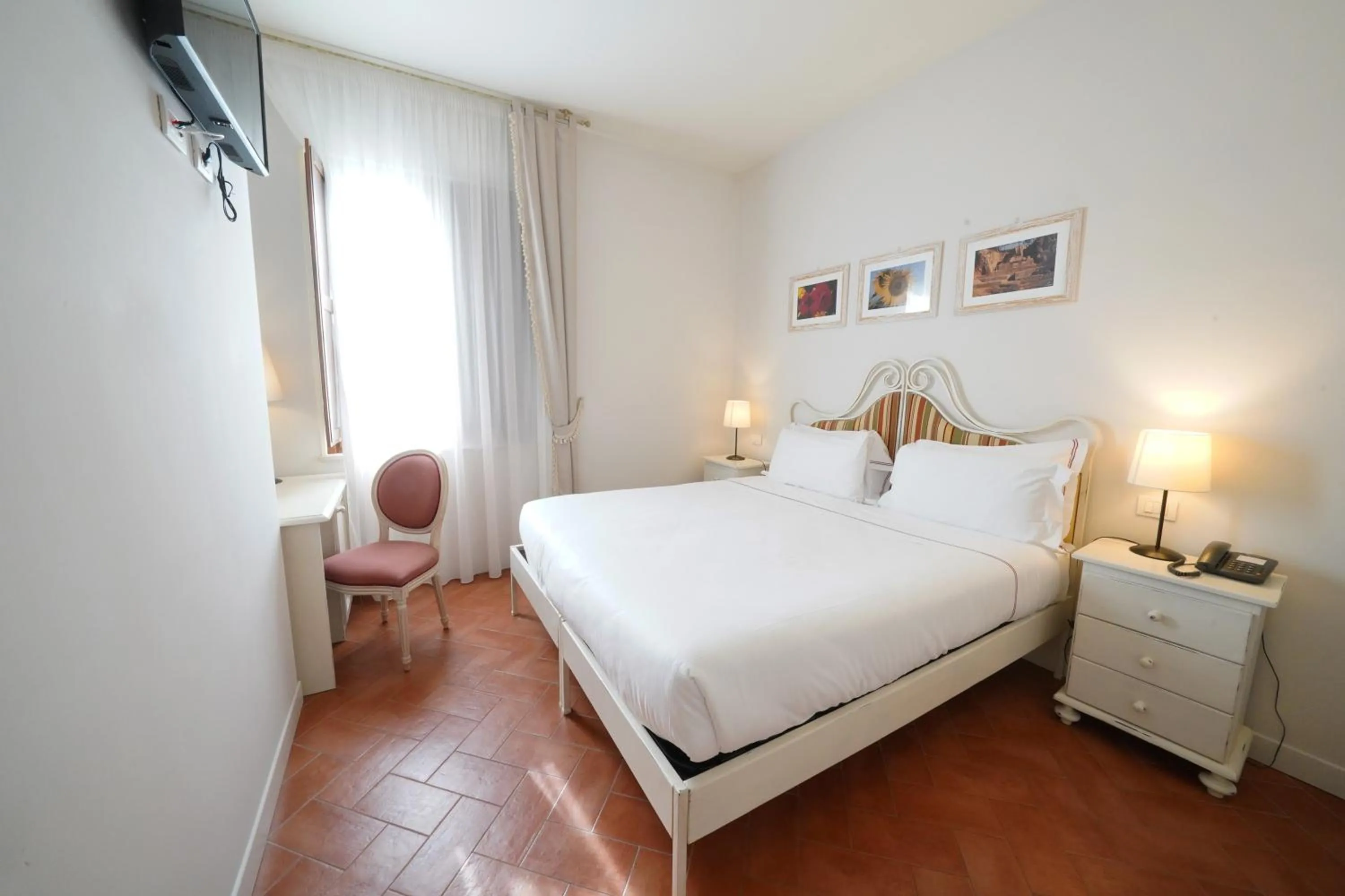 Bed in Saturnia Tuscany Hotel