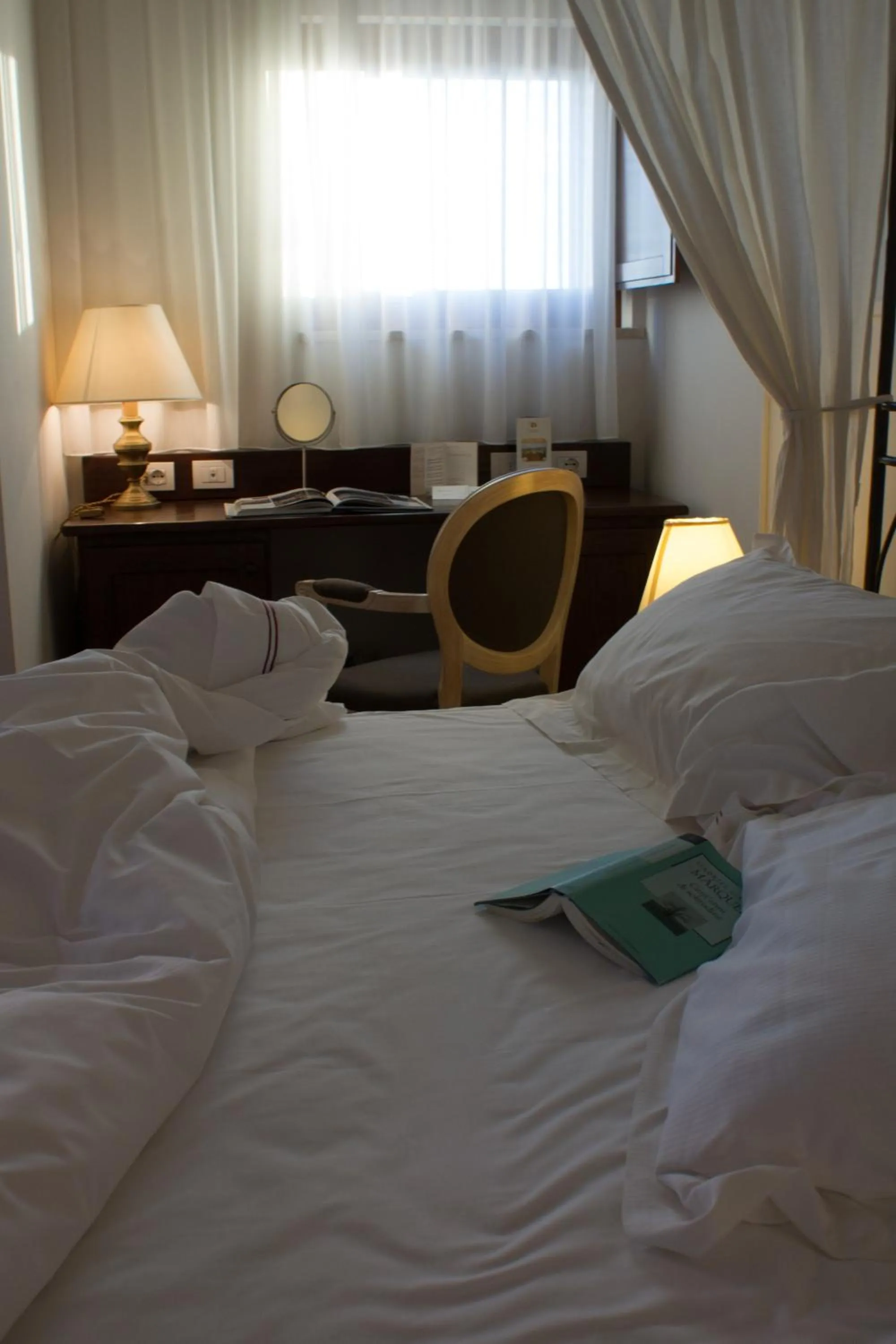 Photo of the whole room, Bed in Saturnia Tuscany Hotel